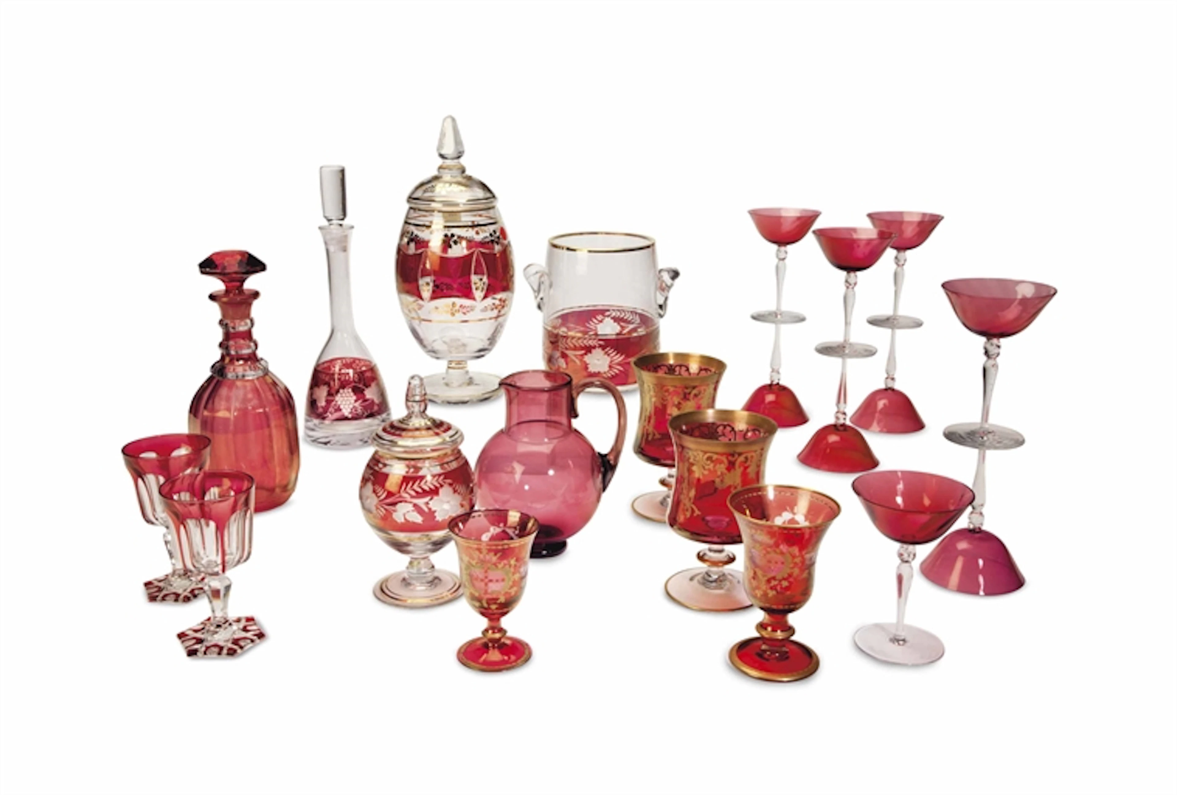 A GROUP OF CONTINENTAL RED AND CLEAR GLASS