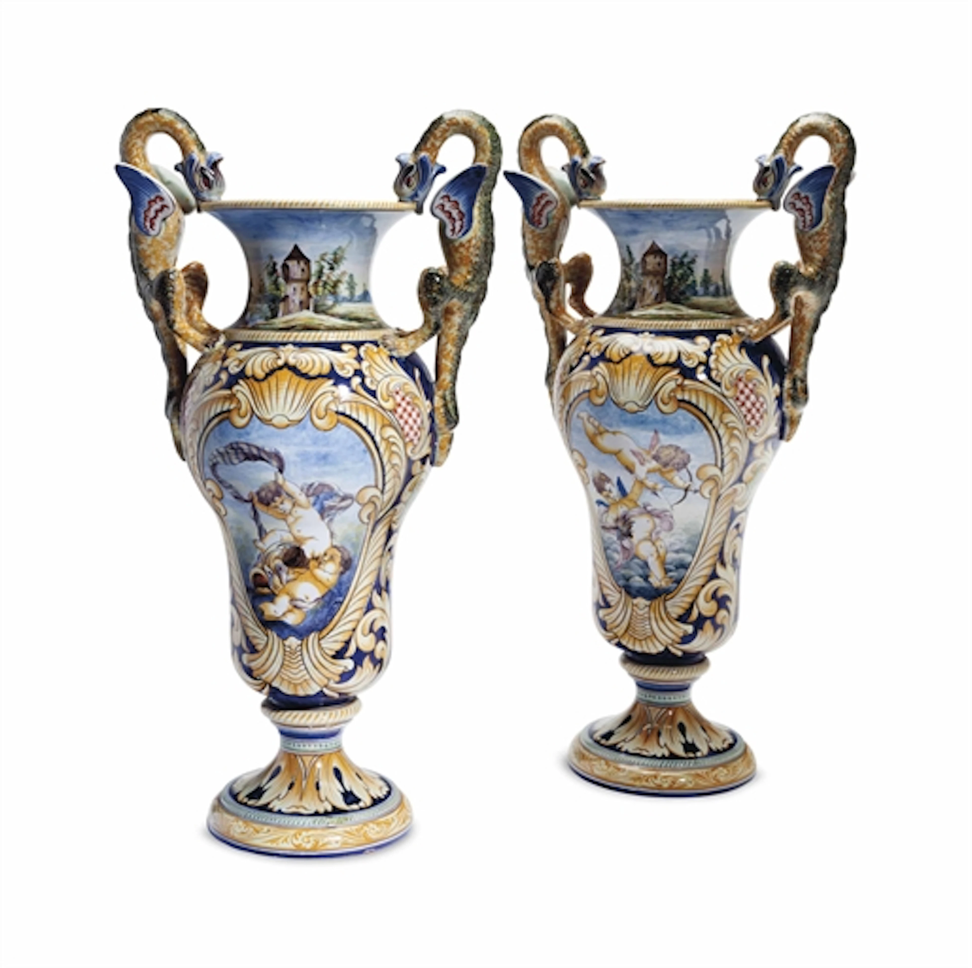 A PAIR OF ITALIAN MAIOLICA DRAGON-HANDELED