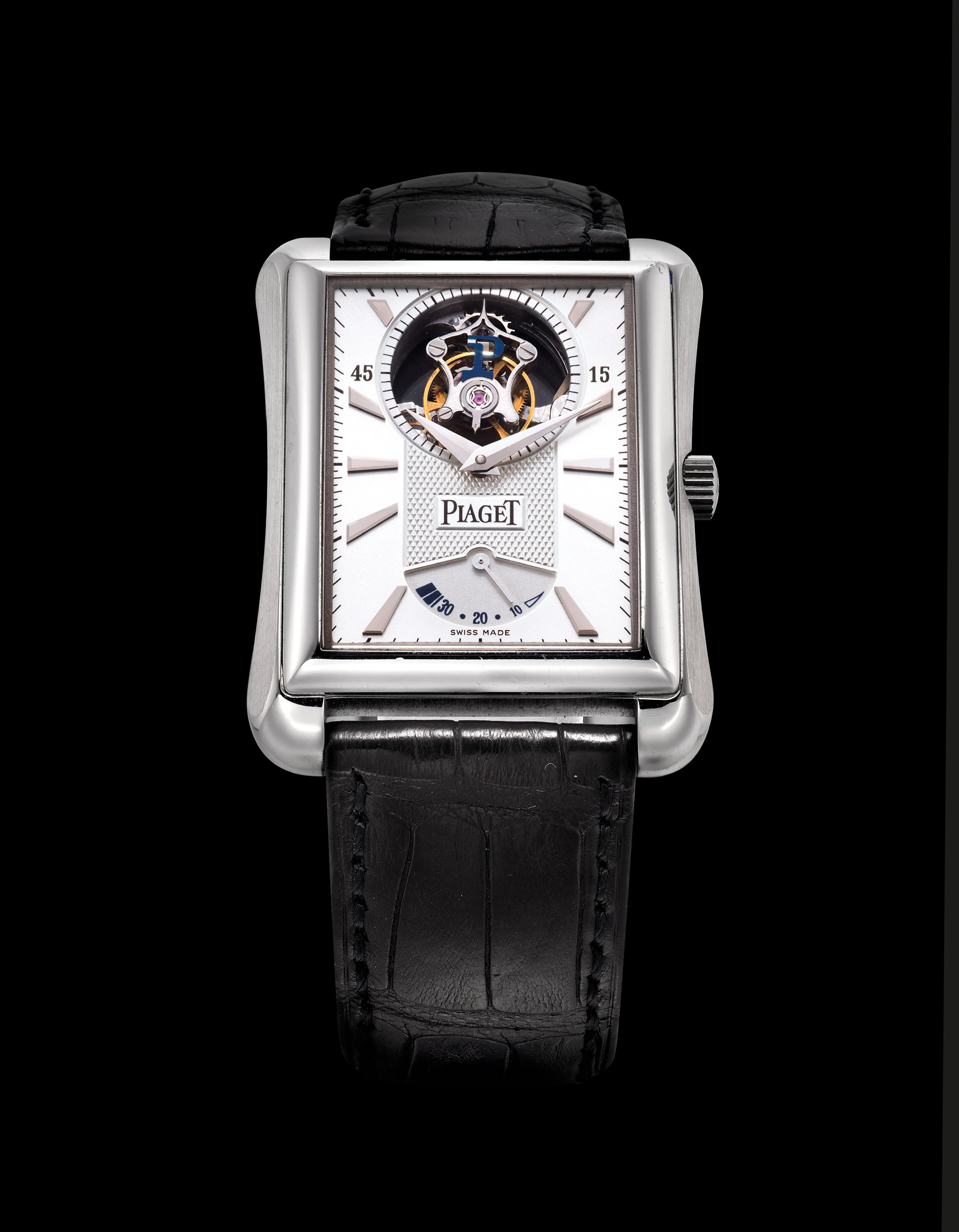 Piaget. a fine 18k white gold rectangular tourbillon wristwatch...