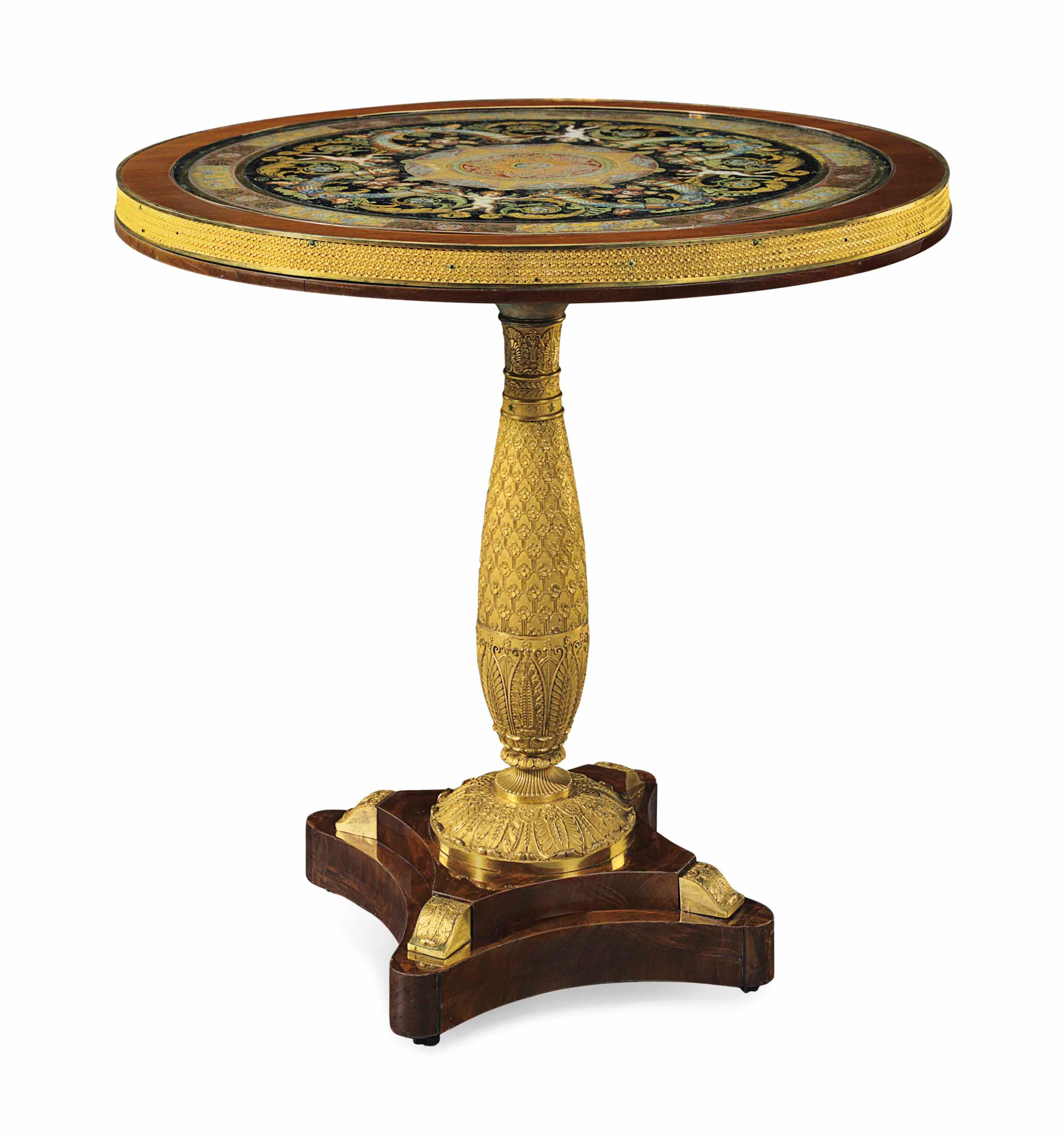 An empire ormolu, mahogany and verre eglomise gueridon