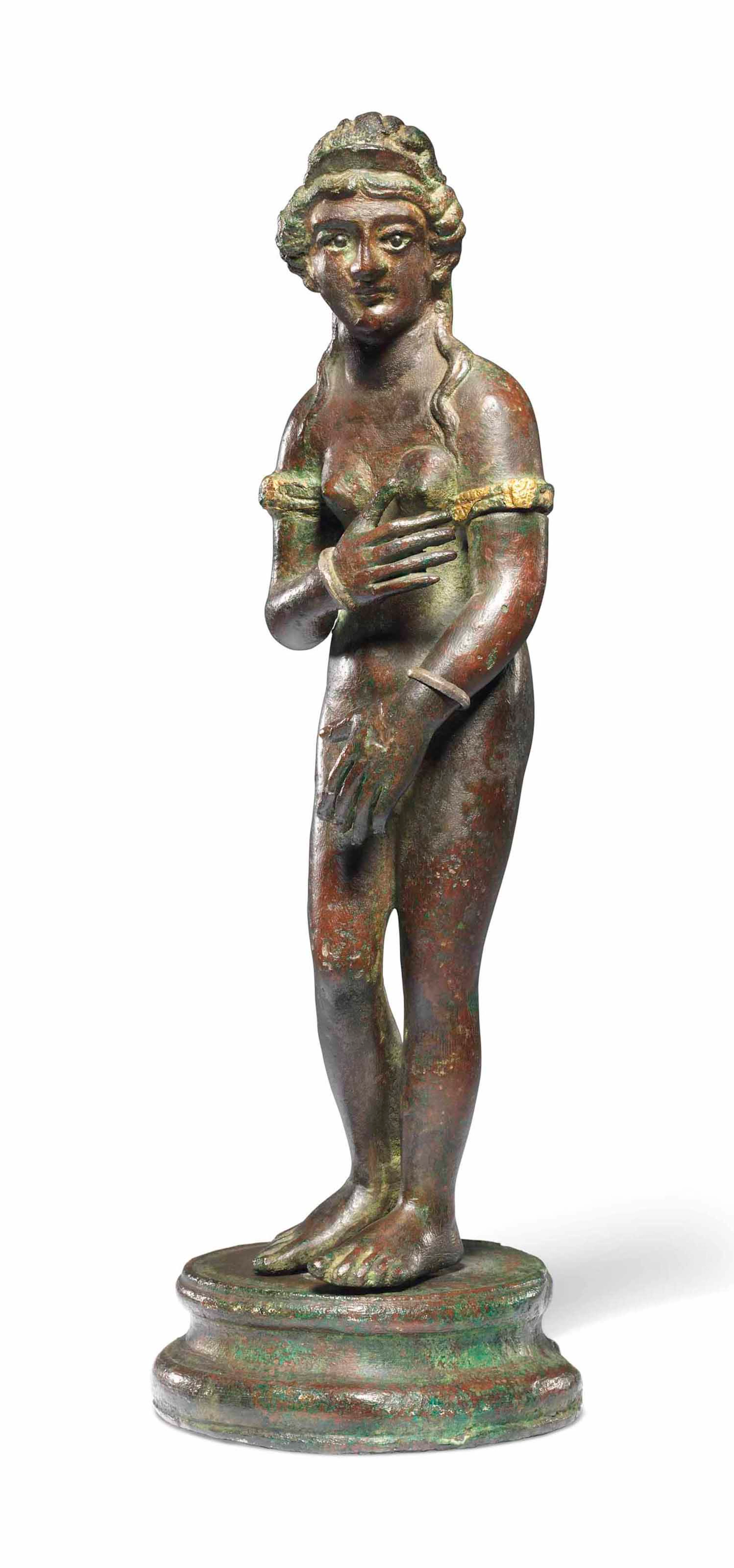 A roman bronze venus pudica