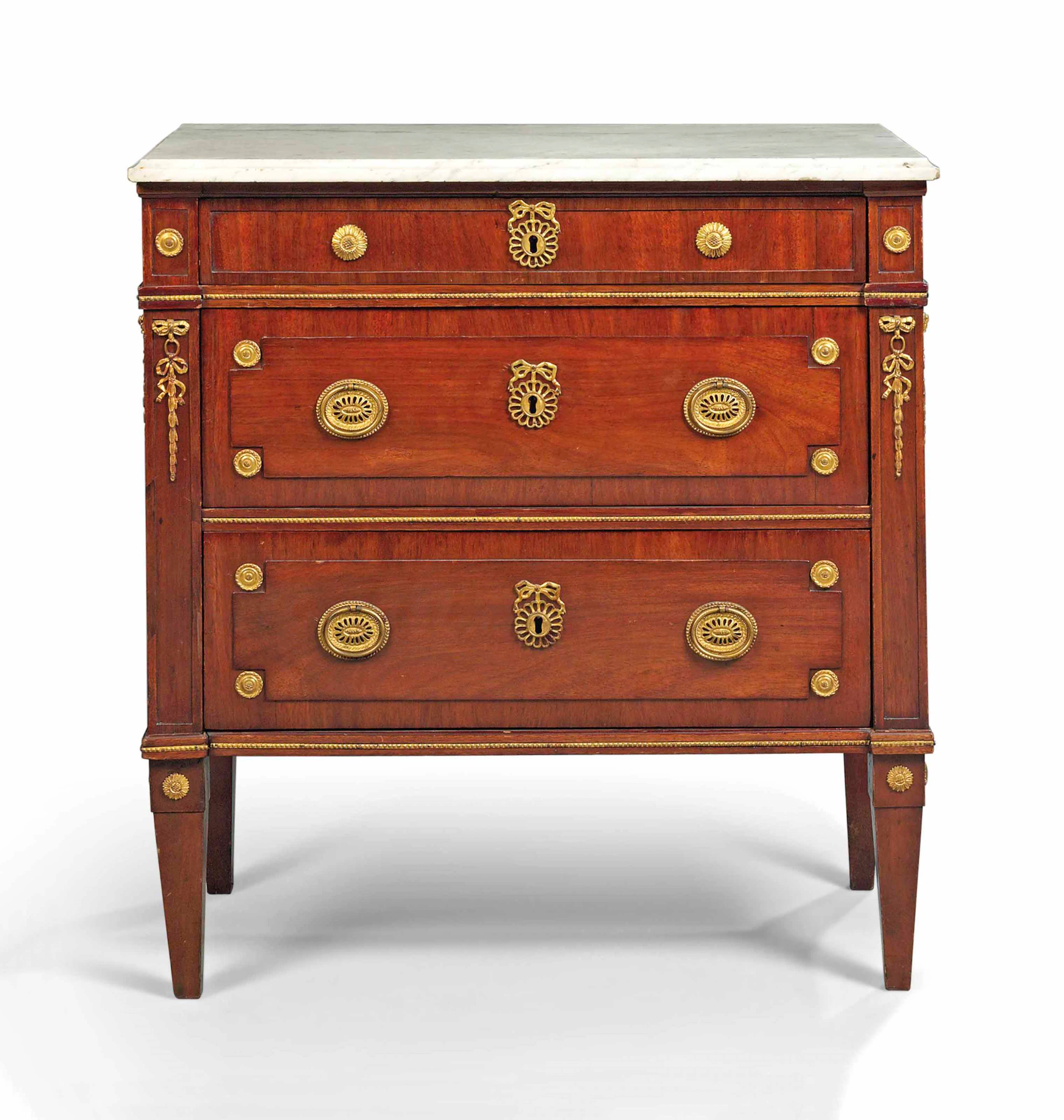 A german ormolu-mounted mahogany commode