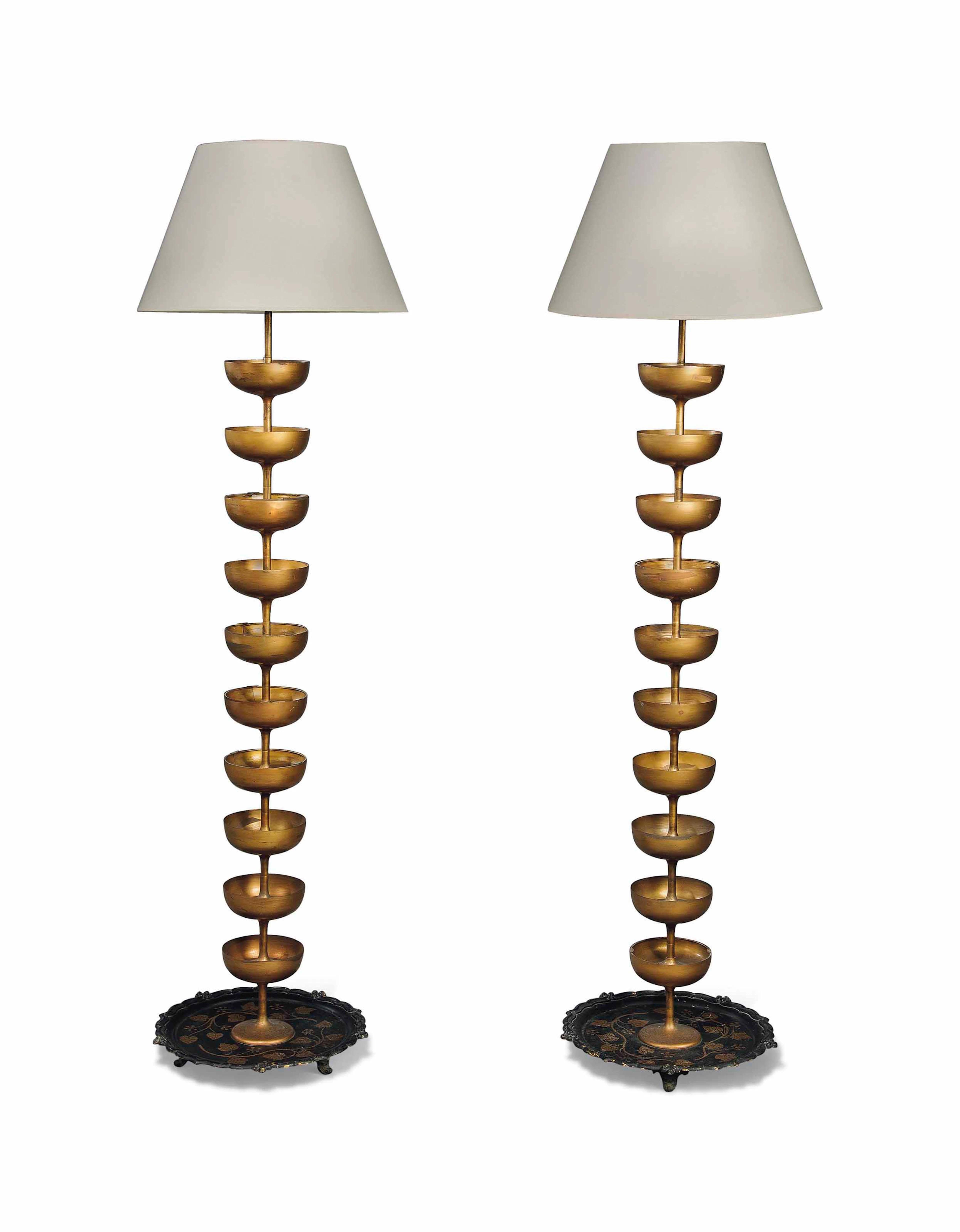 A pair of Champagne standard lamps