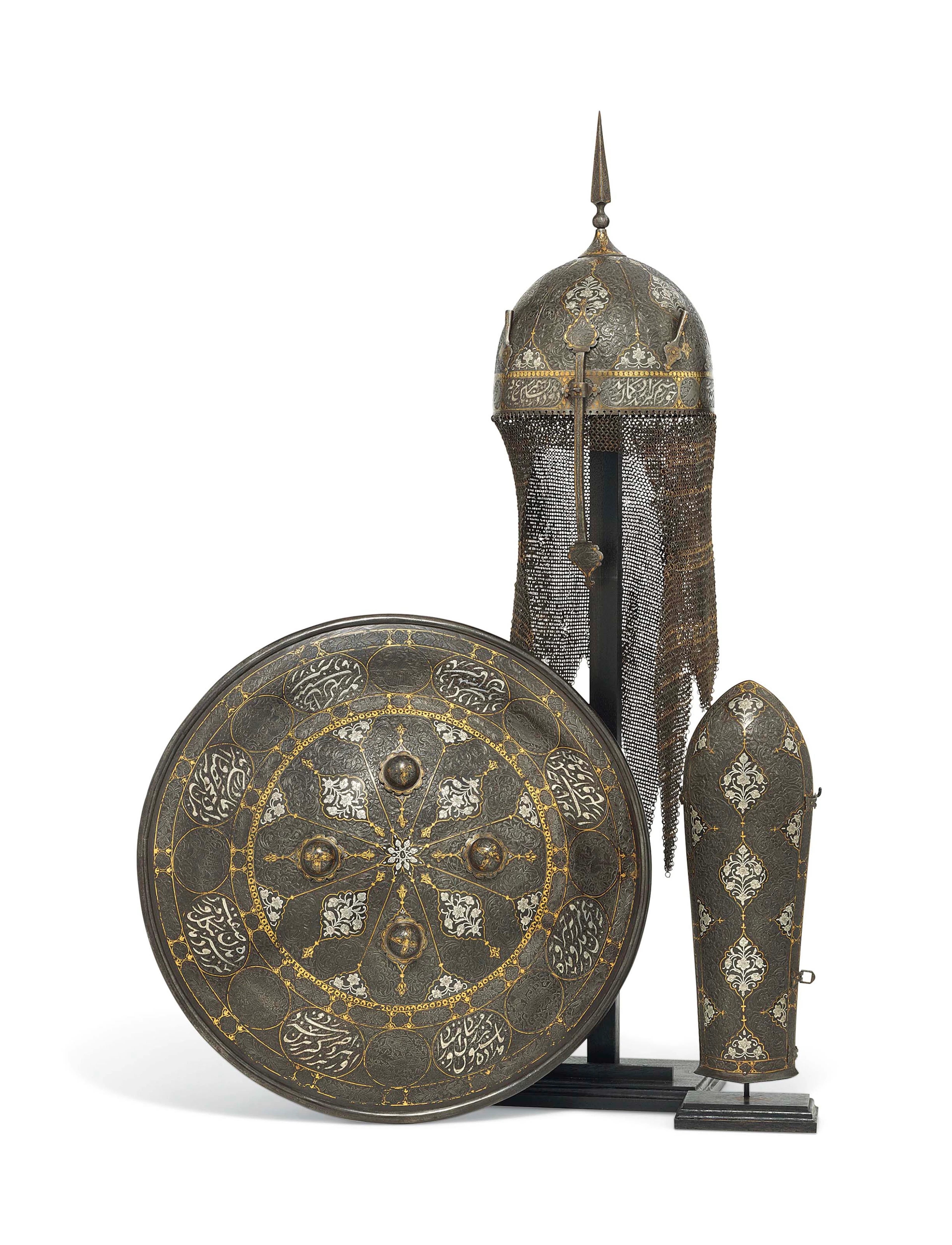 A qajar gold-damascened and silver-inlaid steel helmet (khula khud)