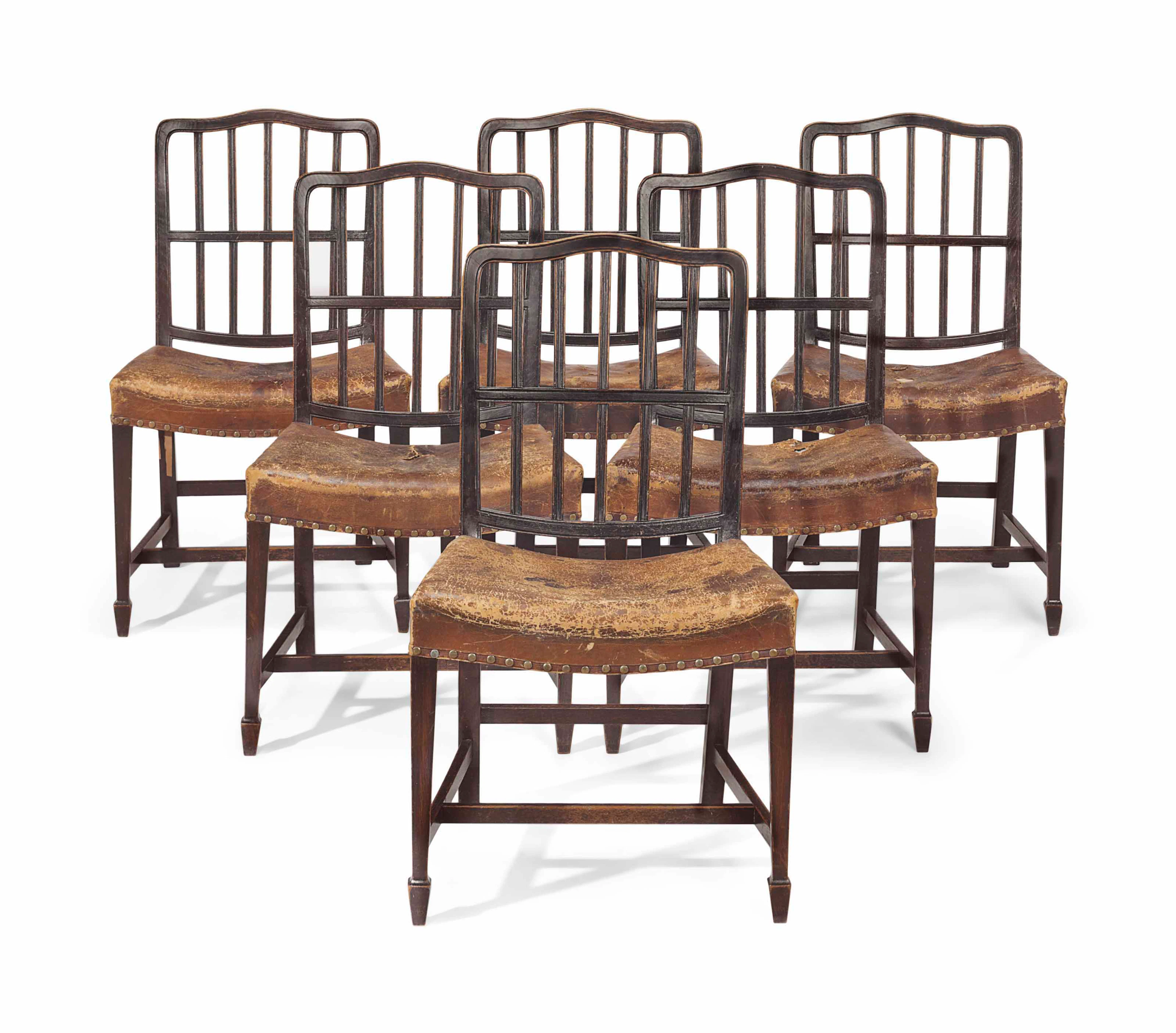 A set of six george iii style ebonized oak side chairs