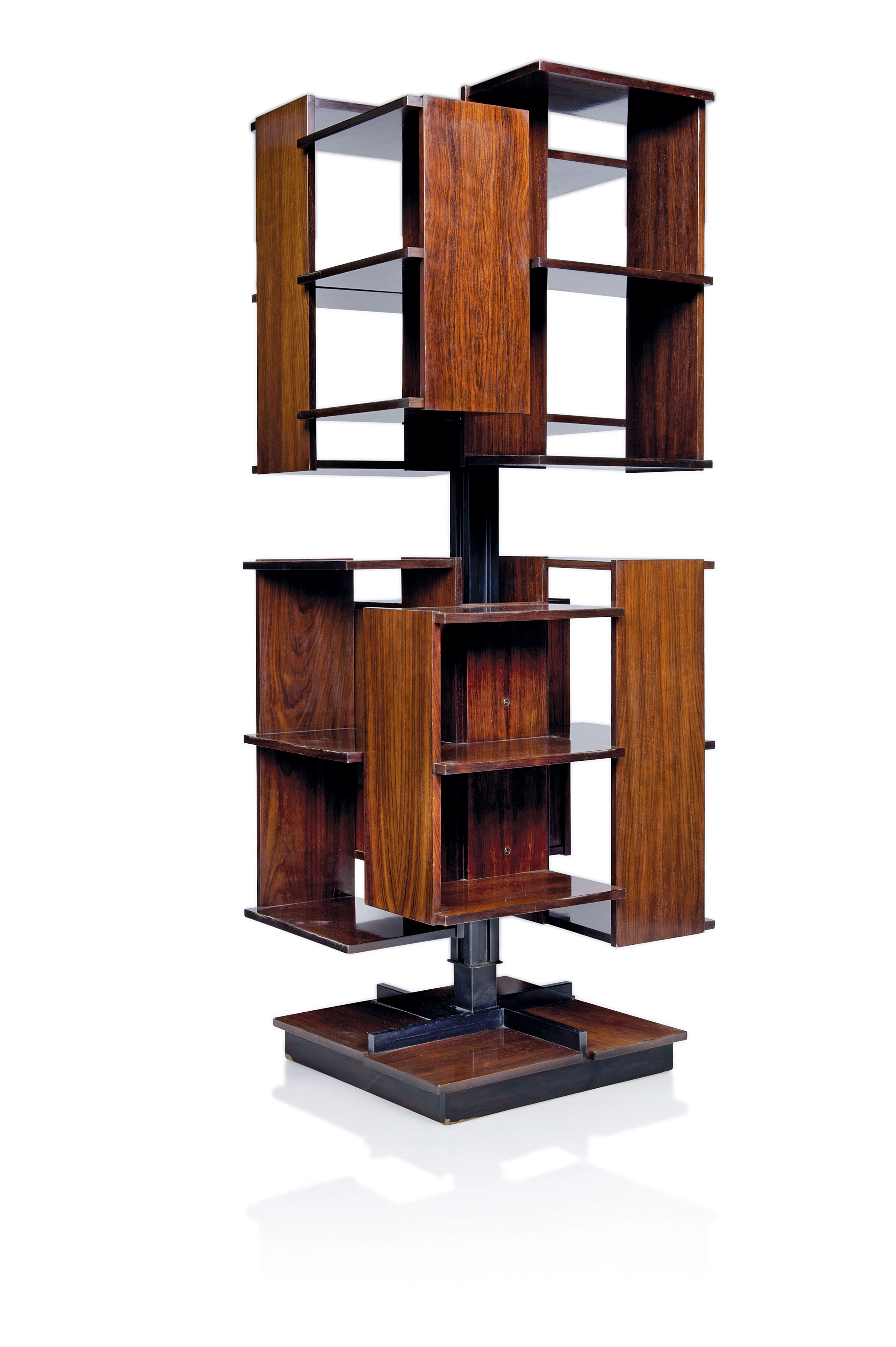A REVOLVING BOOKCASE, DESIGNED 1960