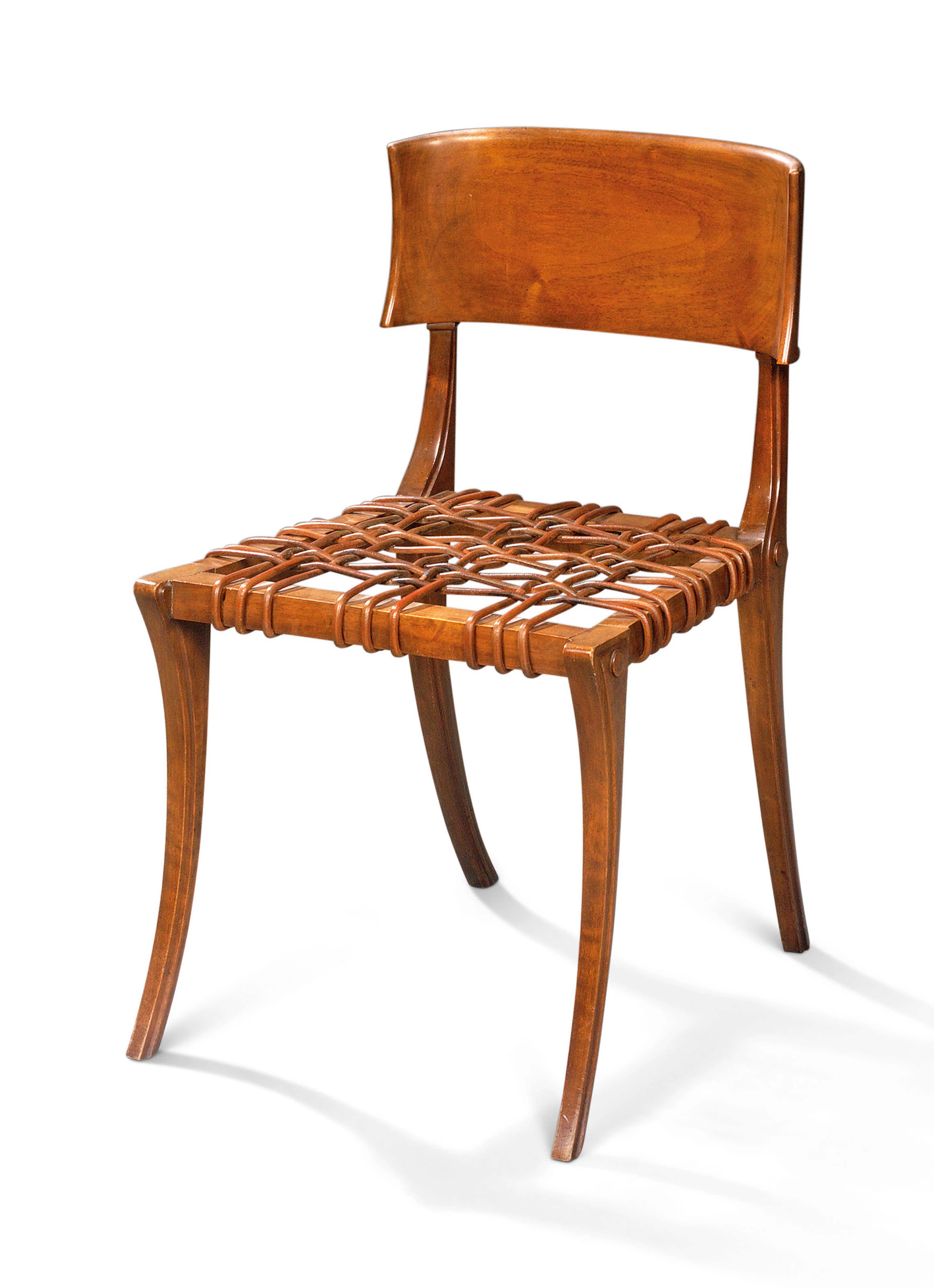 A walnut klismos chair