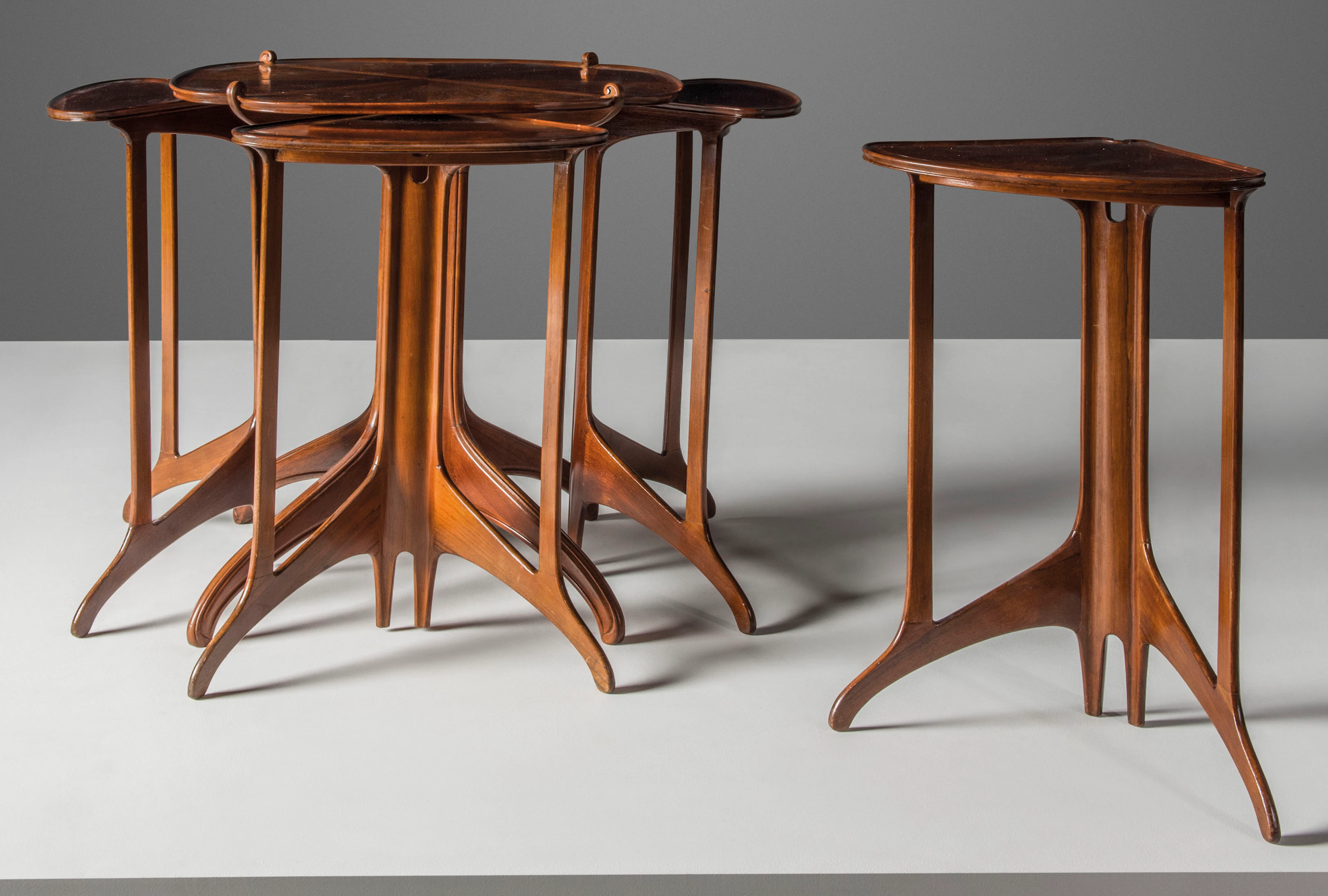A SET OF FIVE NESTING TABLES, CIRCA 1913