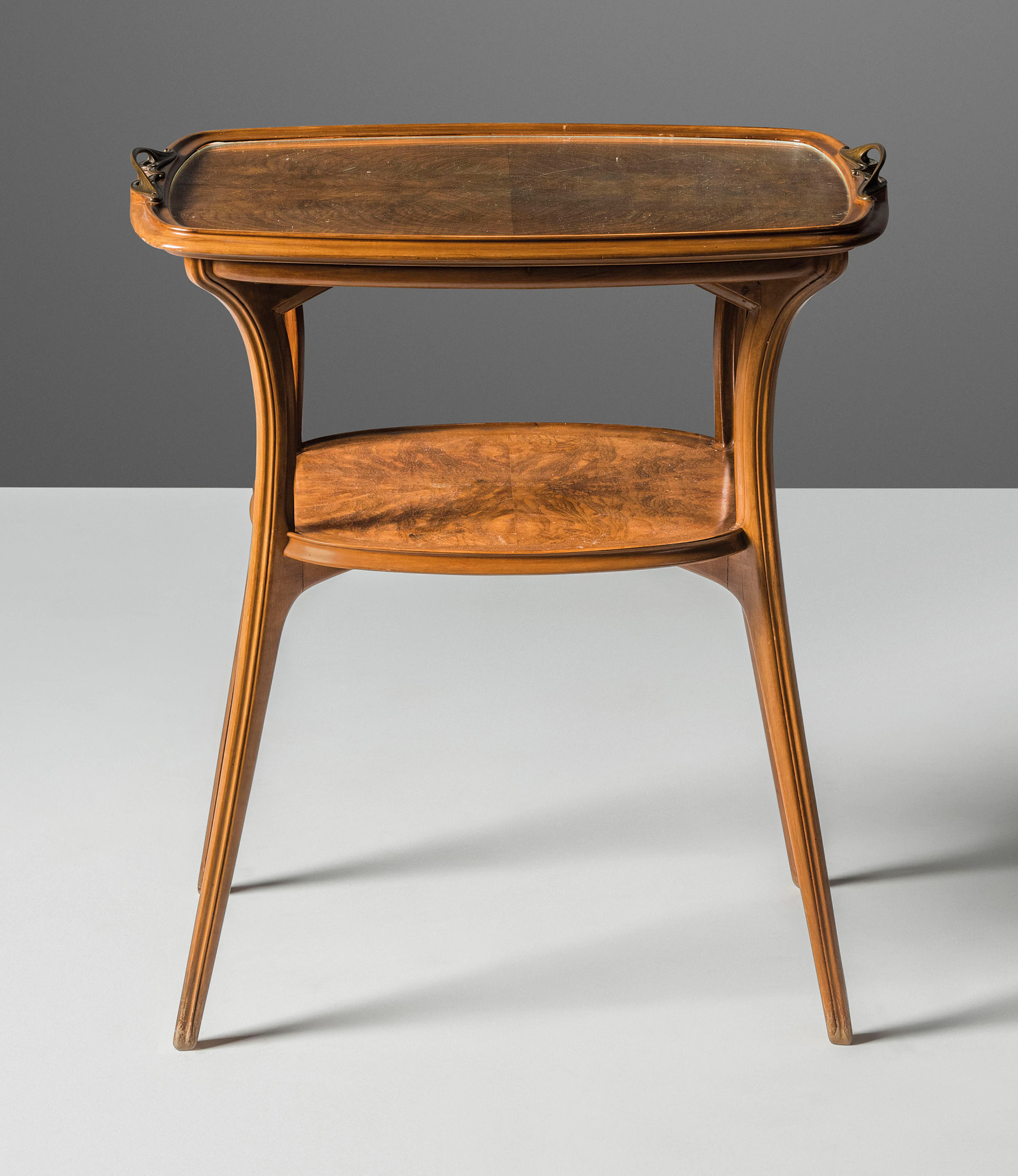 A TWO-TIER OCCASIONAL TABLE, CIRCA 1900