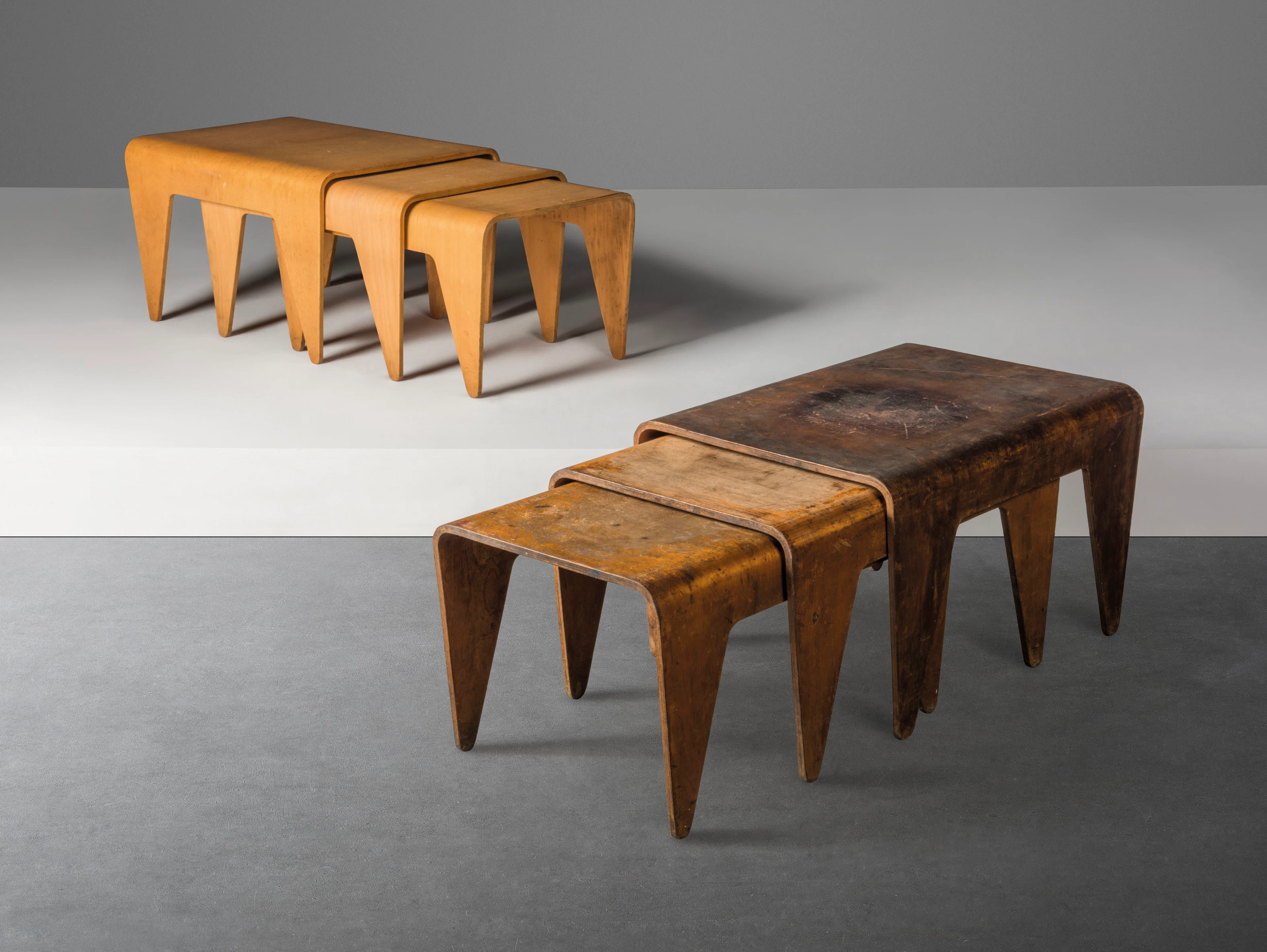 A SET OF THREE NESTING TABLES, CIRCA 1935