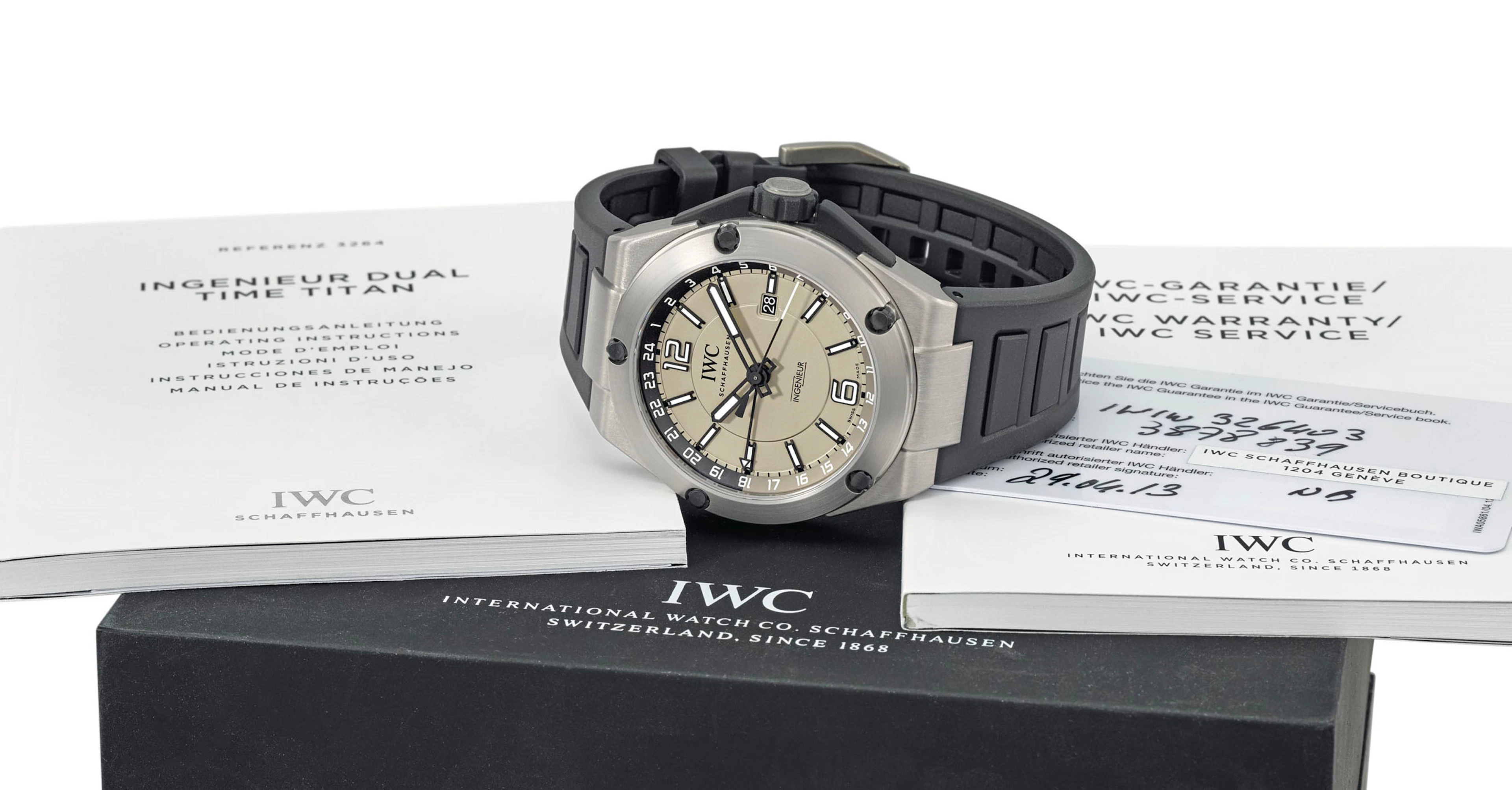 Iwc. a titanium automatic dual time wristwatch with sweep centre seconds