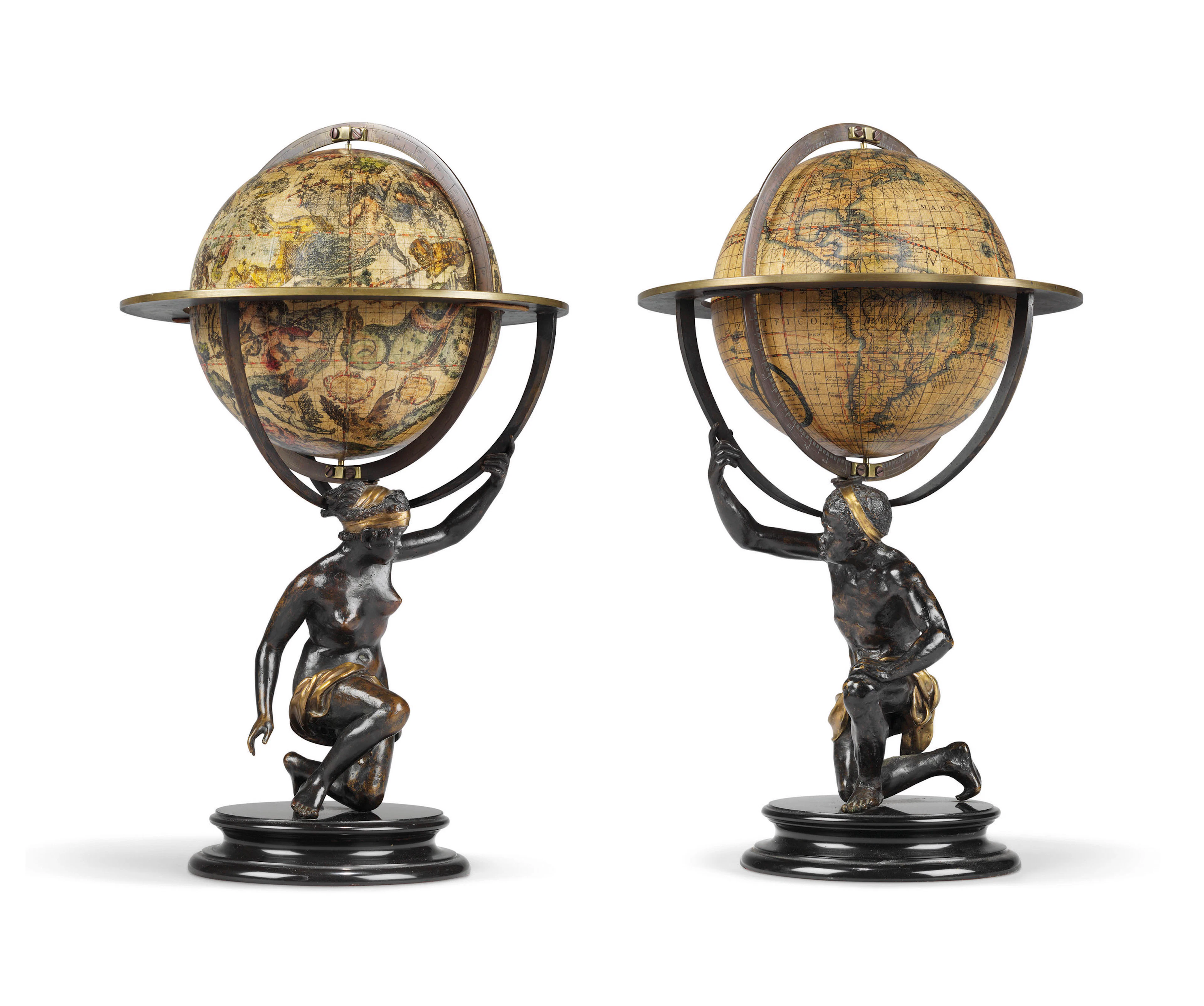 A pair of terrestrial and celestial table globes