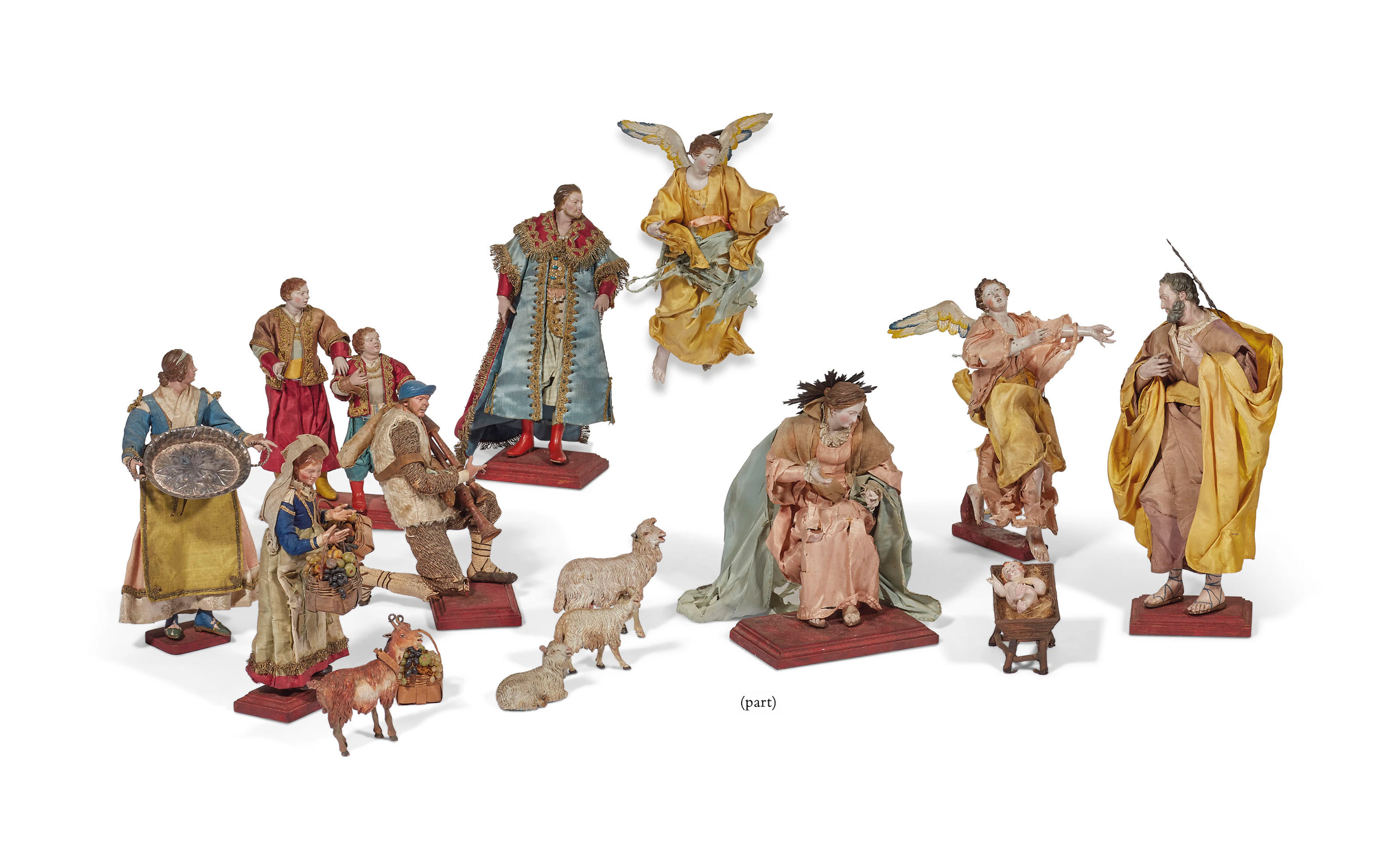 Ensemble de figures et animaux de creche en terre cuite peint polychrome et bois