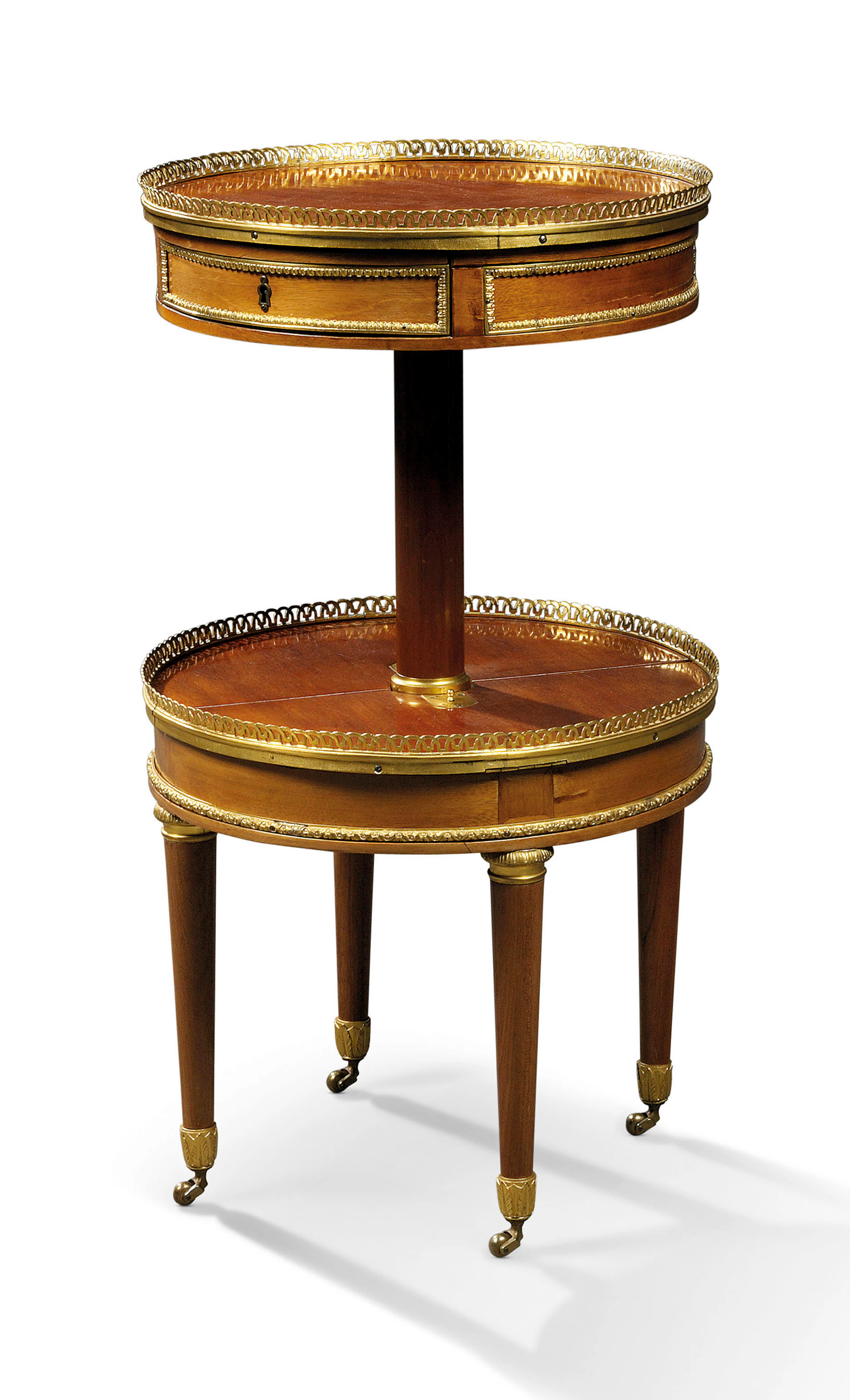 A french ormolu-mounted mahogany and bois satine table a ouvrage