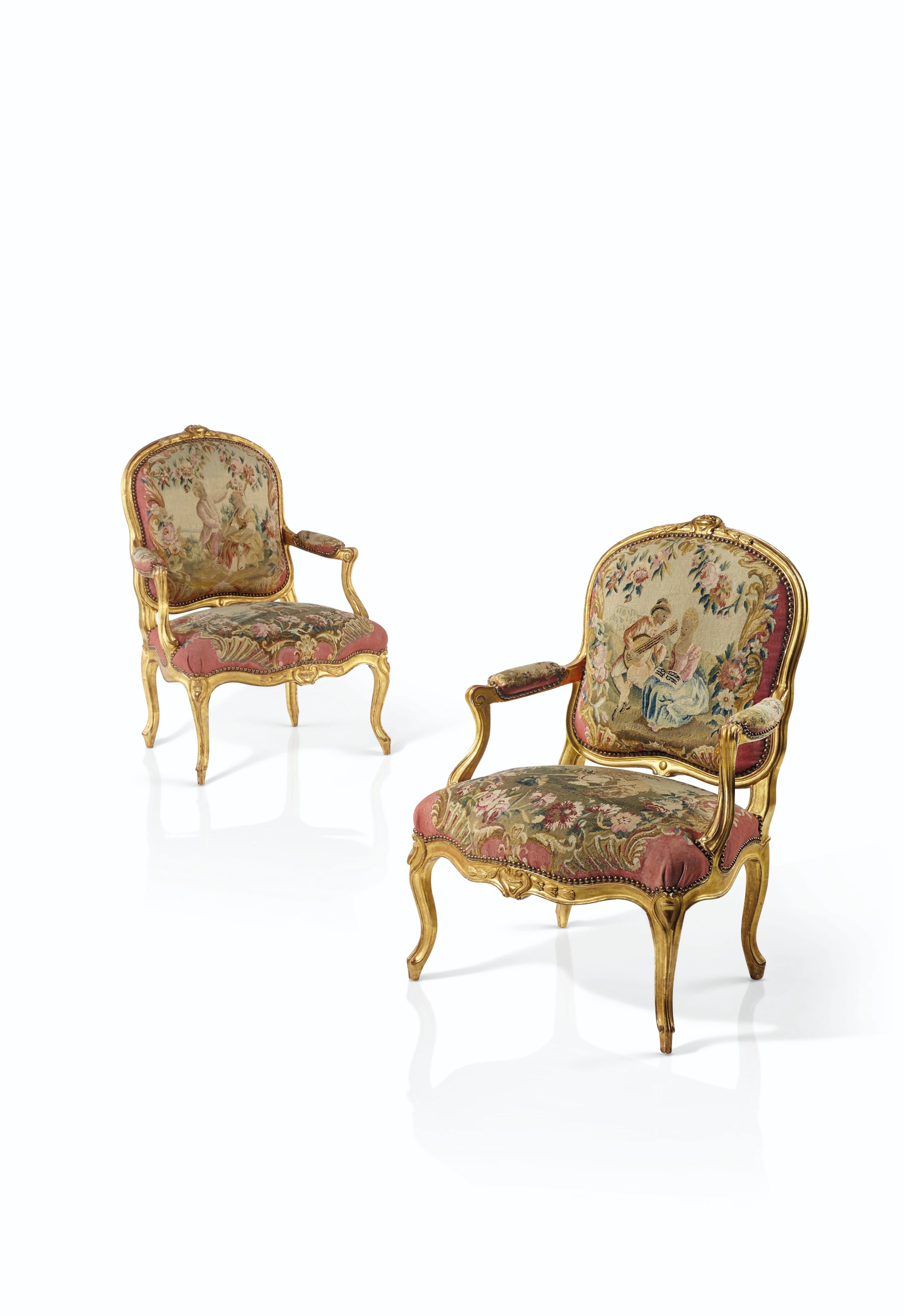 A PAIR OF LOUIS XV GILT-WALNUT FAUTEUILS