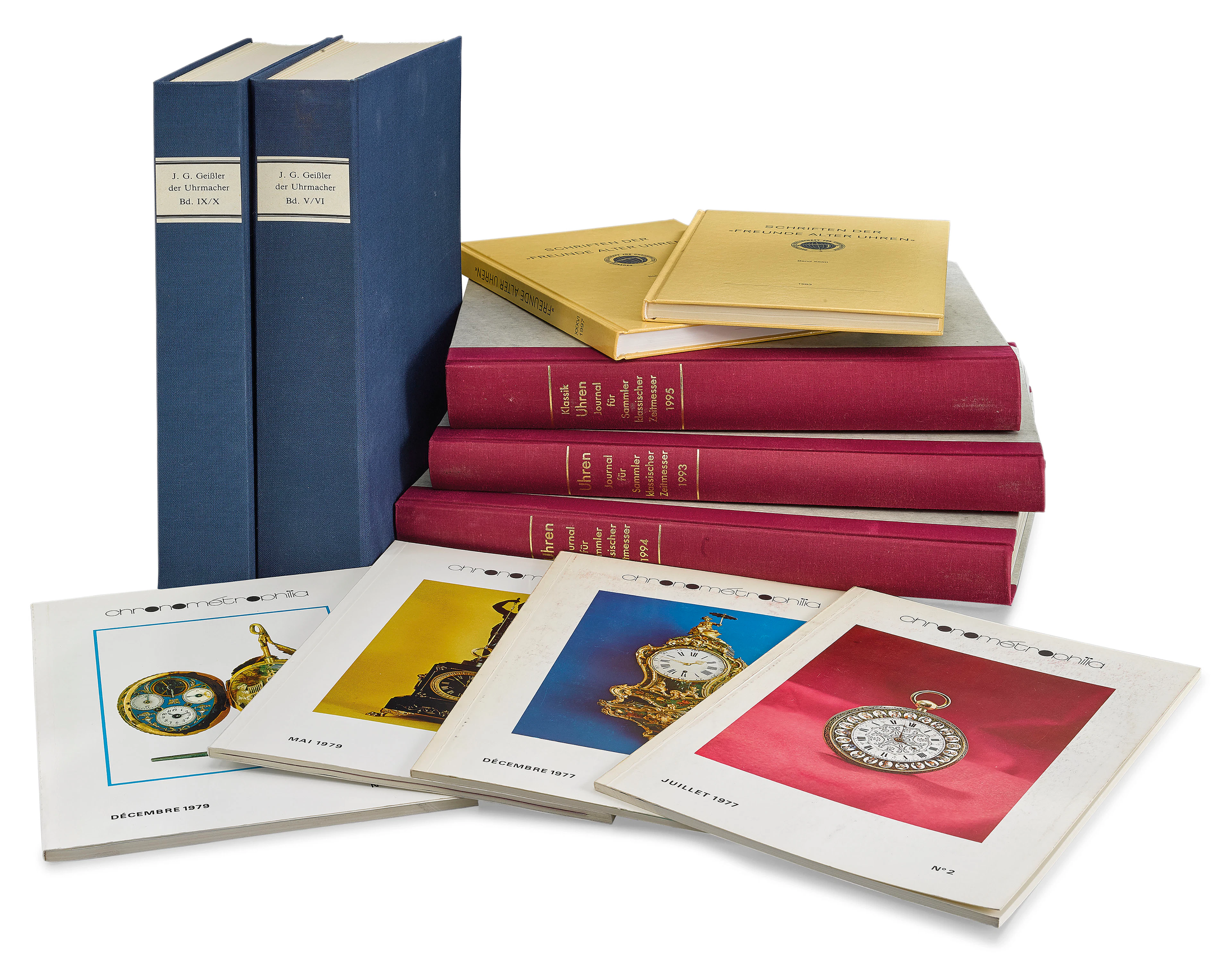 AN EXTENSIVE COLLECTION OF VARIOUS GERMAN AND FRENCH WATCH BOOKS AND MAGAZINES