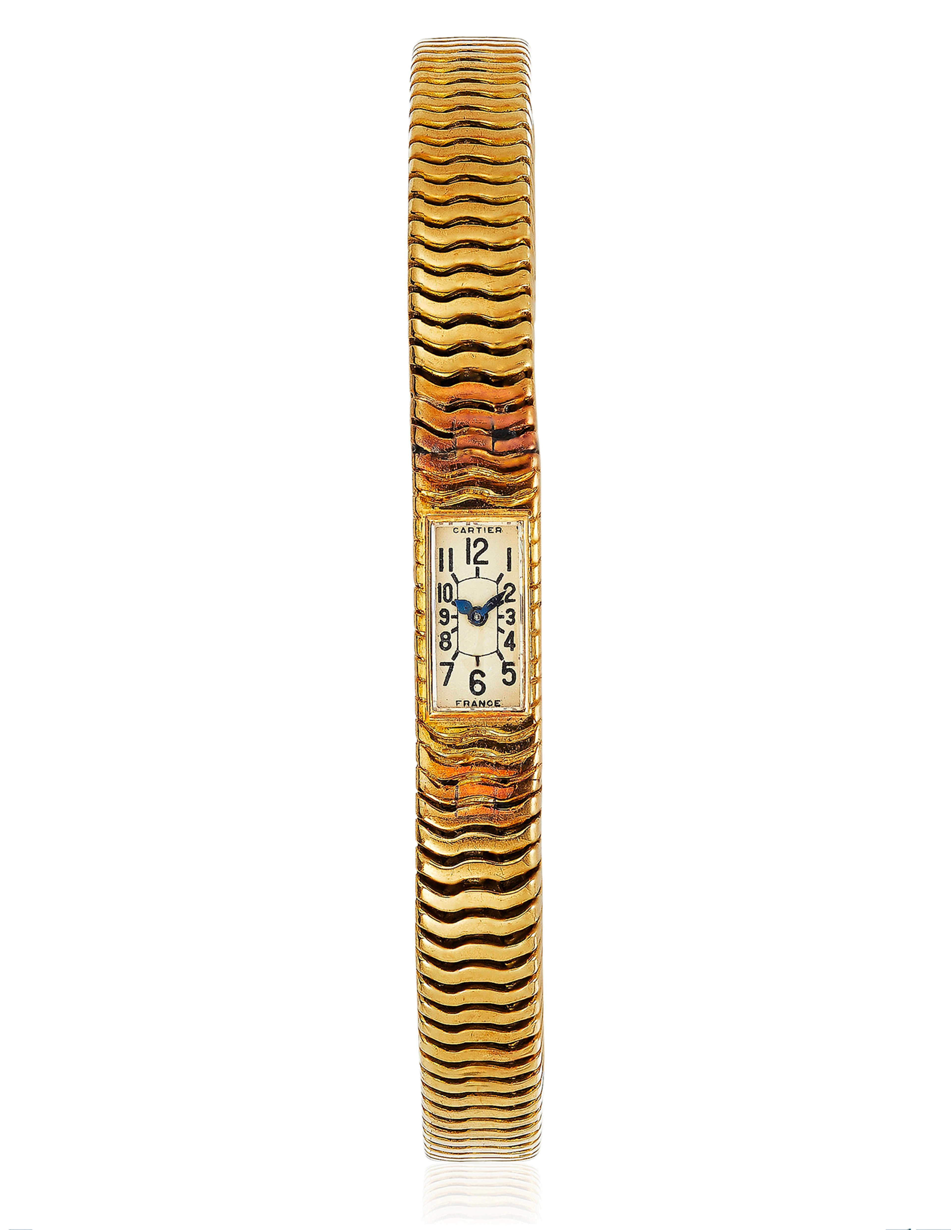 CARTIER GOLD WATCH BRACELET –