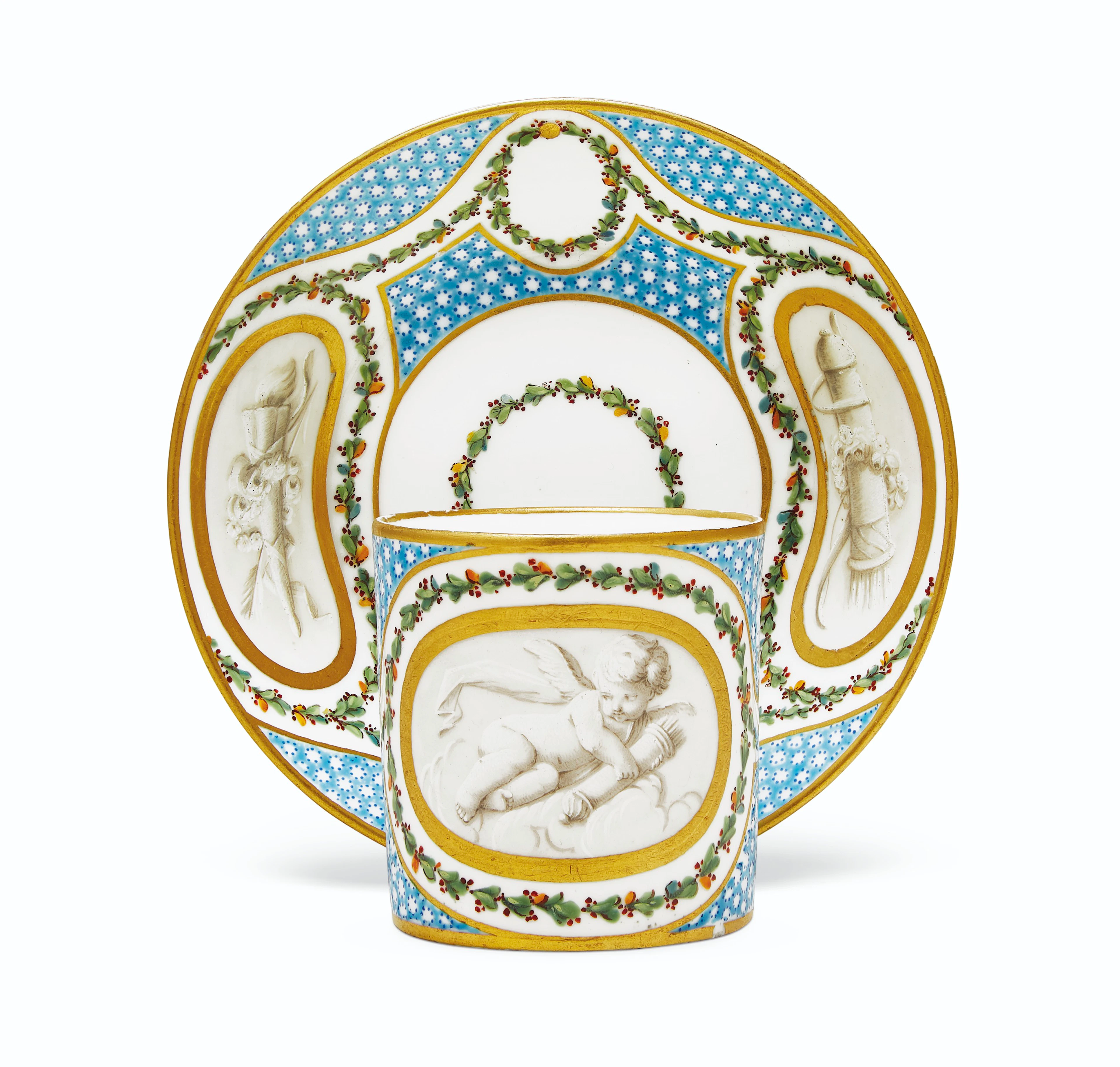 A SEVRES PORCELAIN BLEU CELESTE POINTILLE CUP AND SAUCER...
