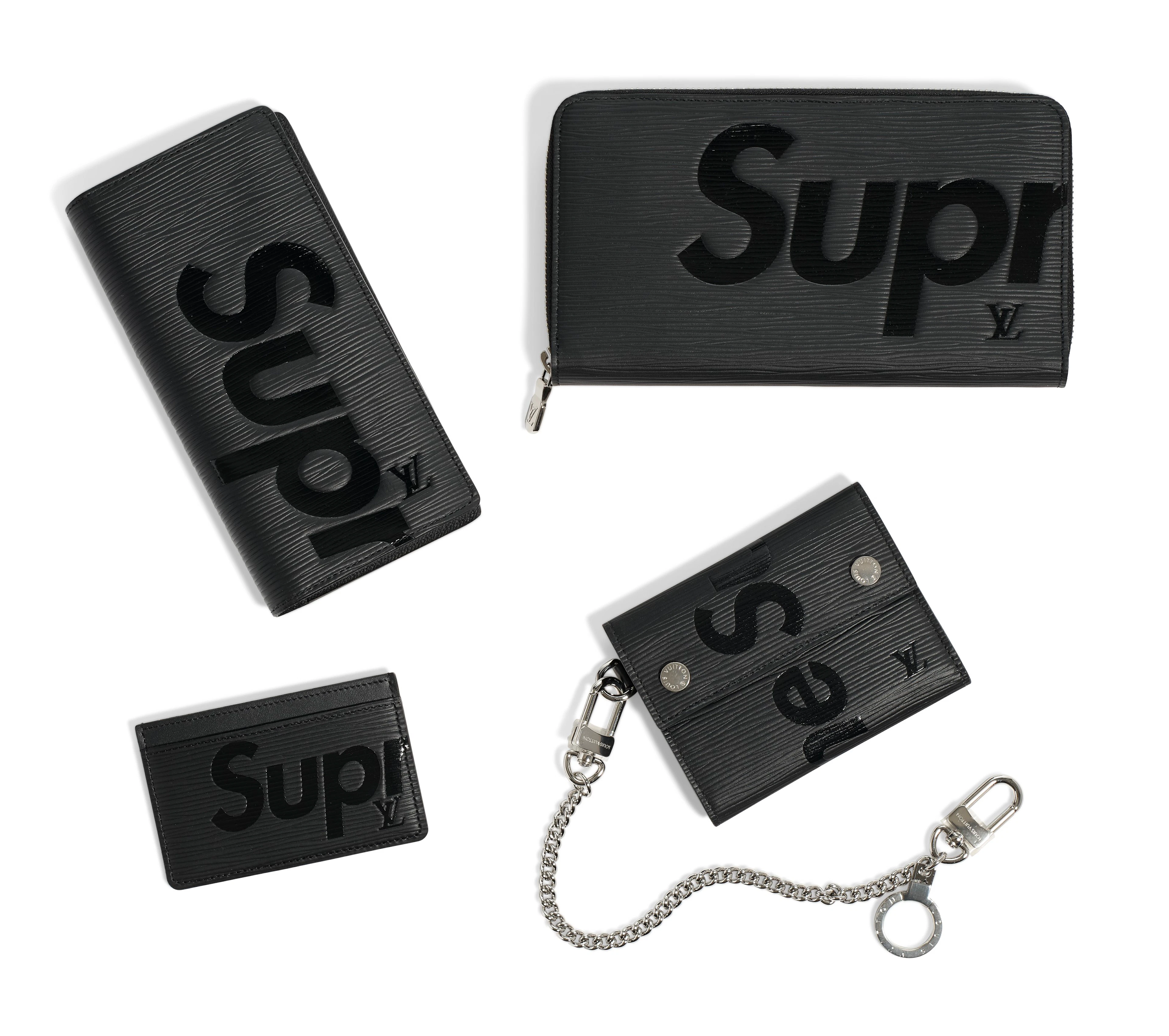 A COLLECTION OF BLACK EPI LEATHER ACCESSORIES