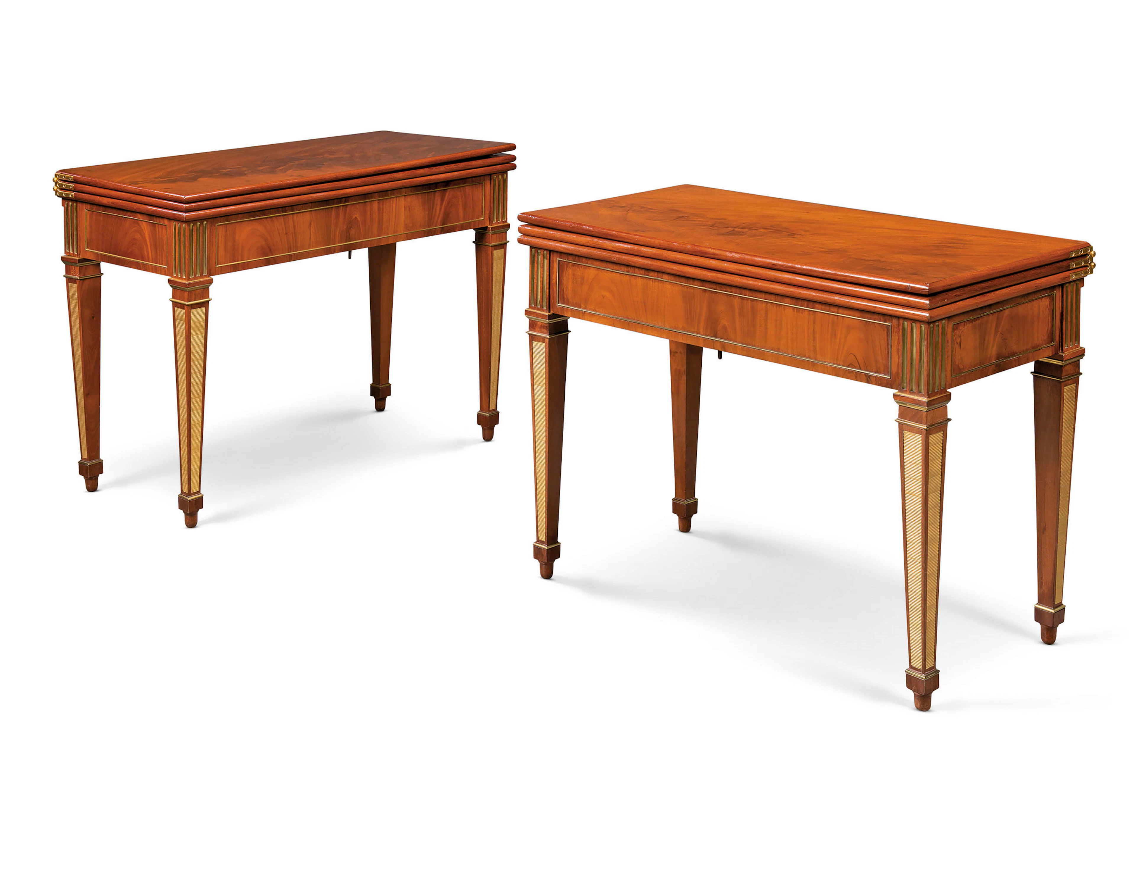 A PAIR OF GERMAN ORMOLU AND BRASS-MOUNTED MAHOGANY MECHANICAL GAMES TABLE
