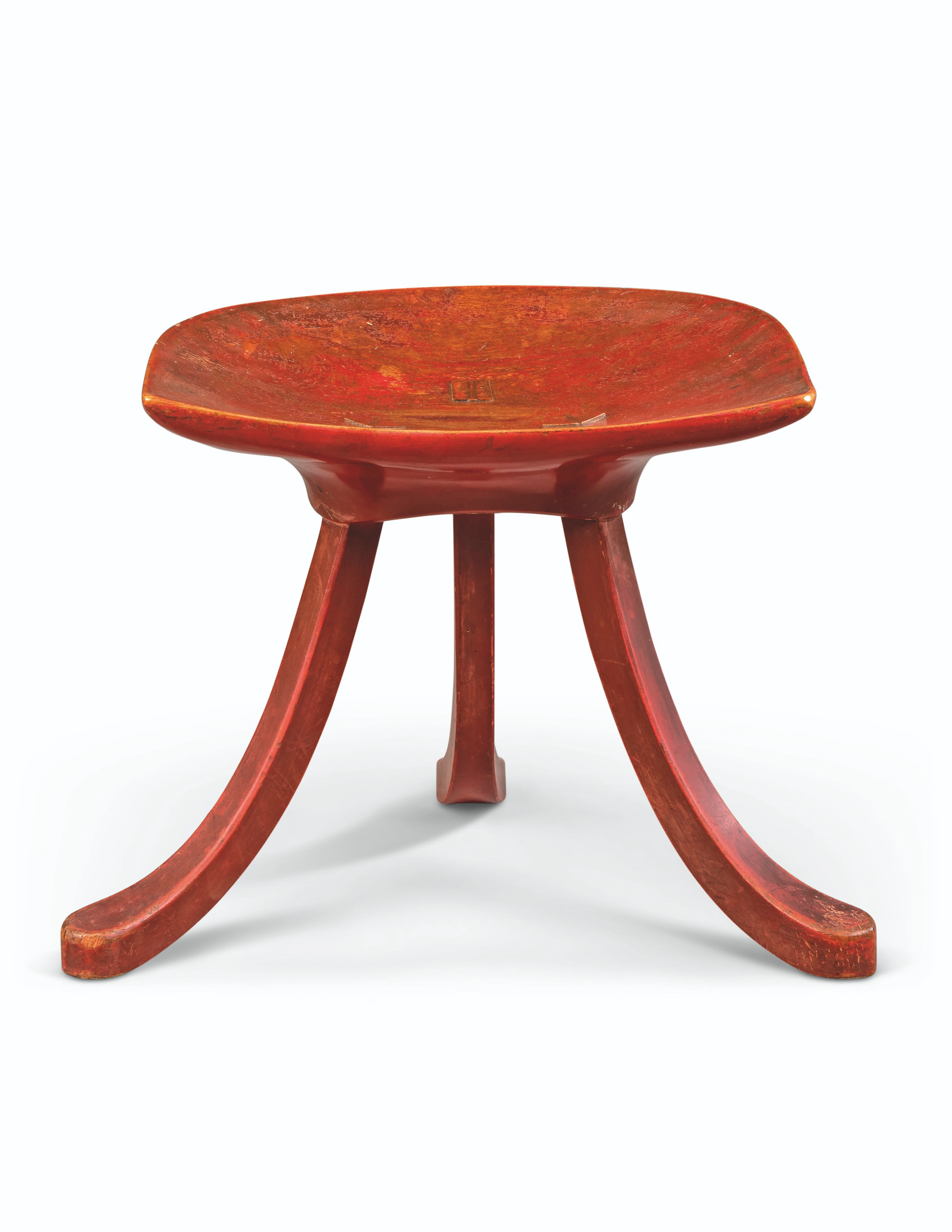 AN EGYPTIAN REVIVAL RED PAINTED 'THEBES' STOOL