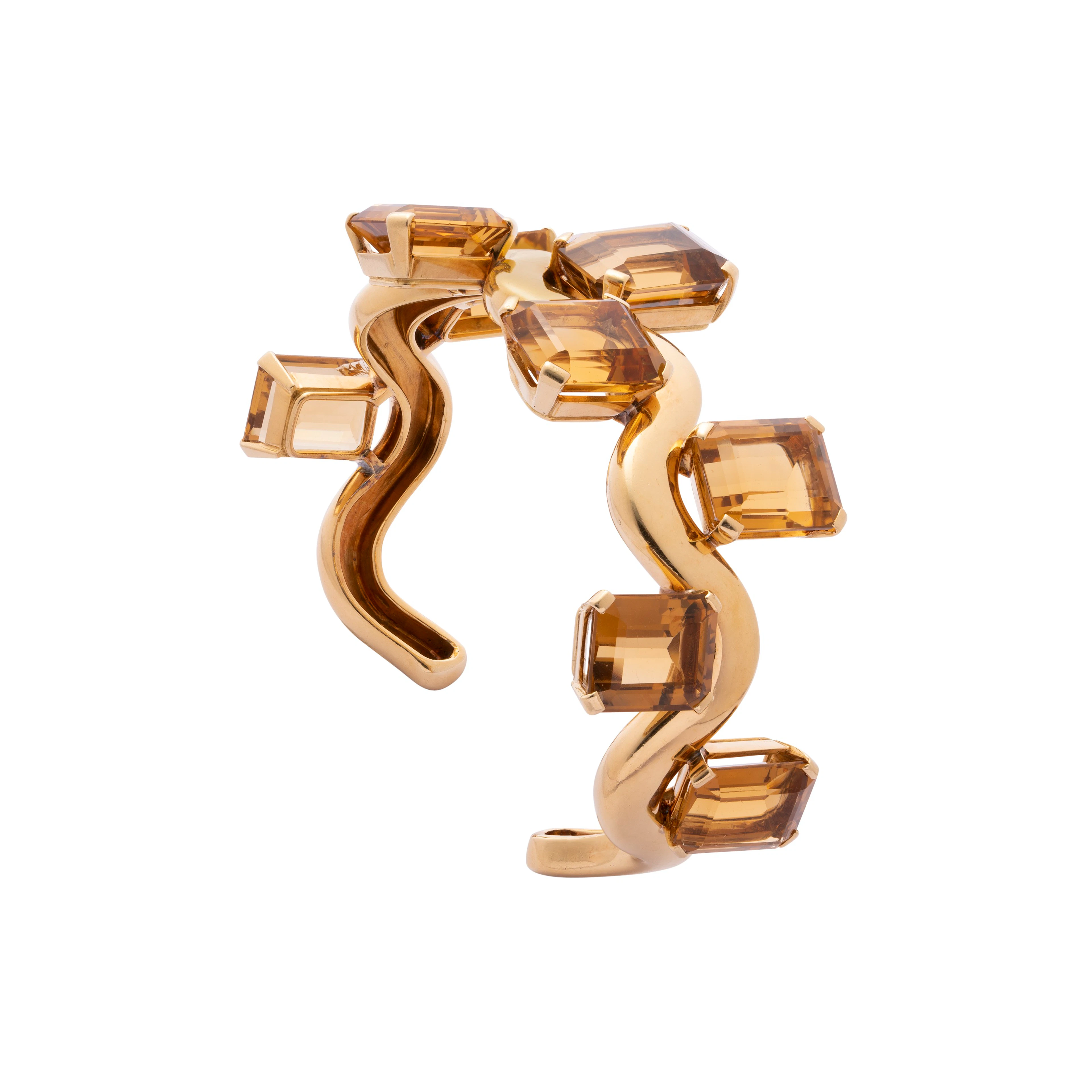 SUZANNE BELPERRON MID-20TH CENTURY CITRINE AND GOLD 'WAVE' BANGLE