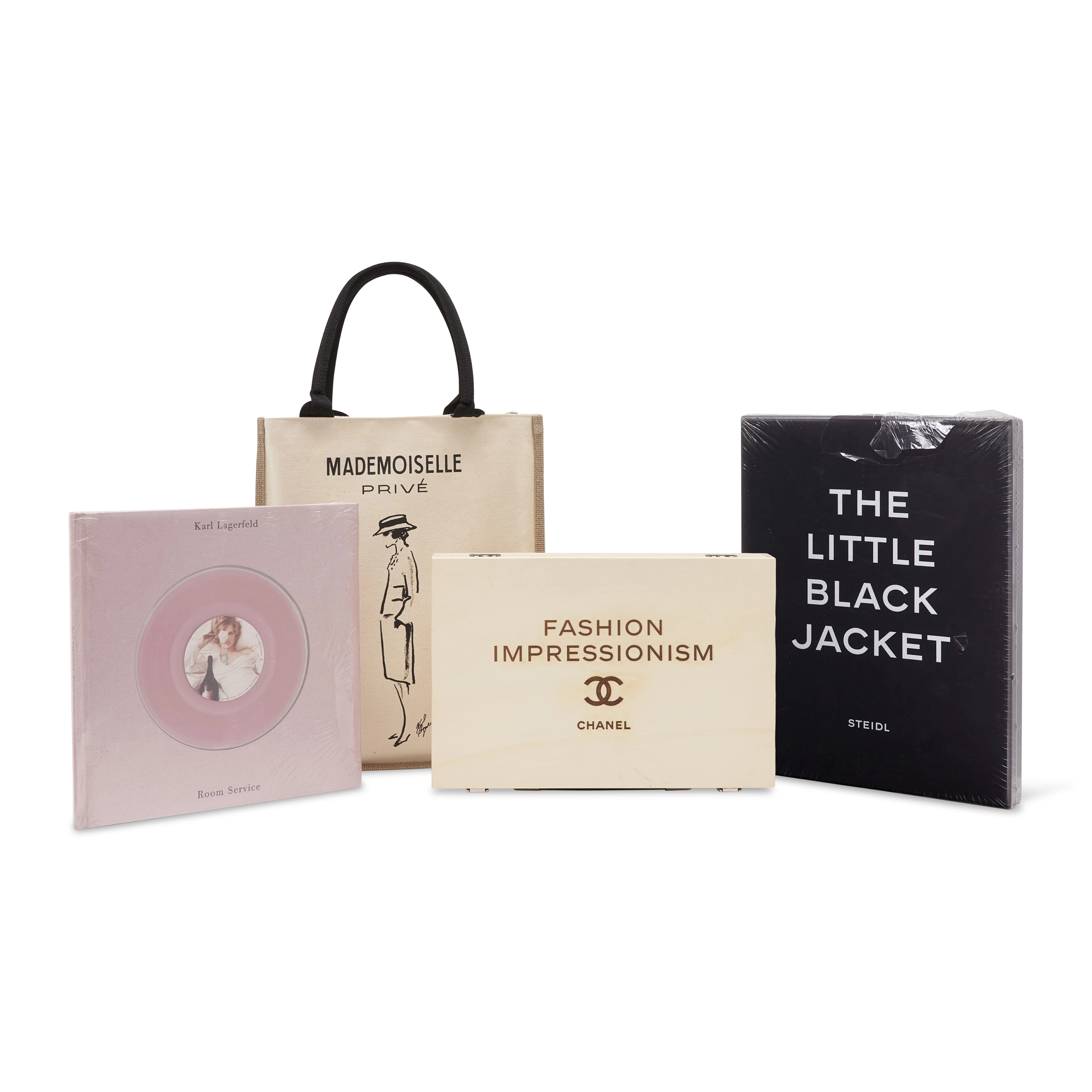 A SET OF THREE: A COLLECTIBLE BOOK & VINYL SET, A BOOK AND AN EXCLUSIVE SET