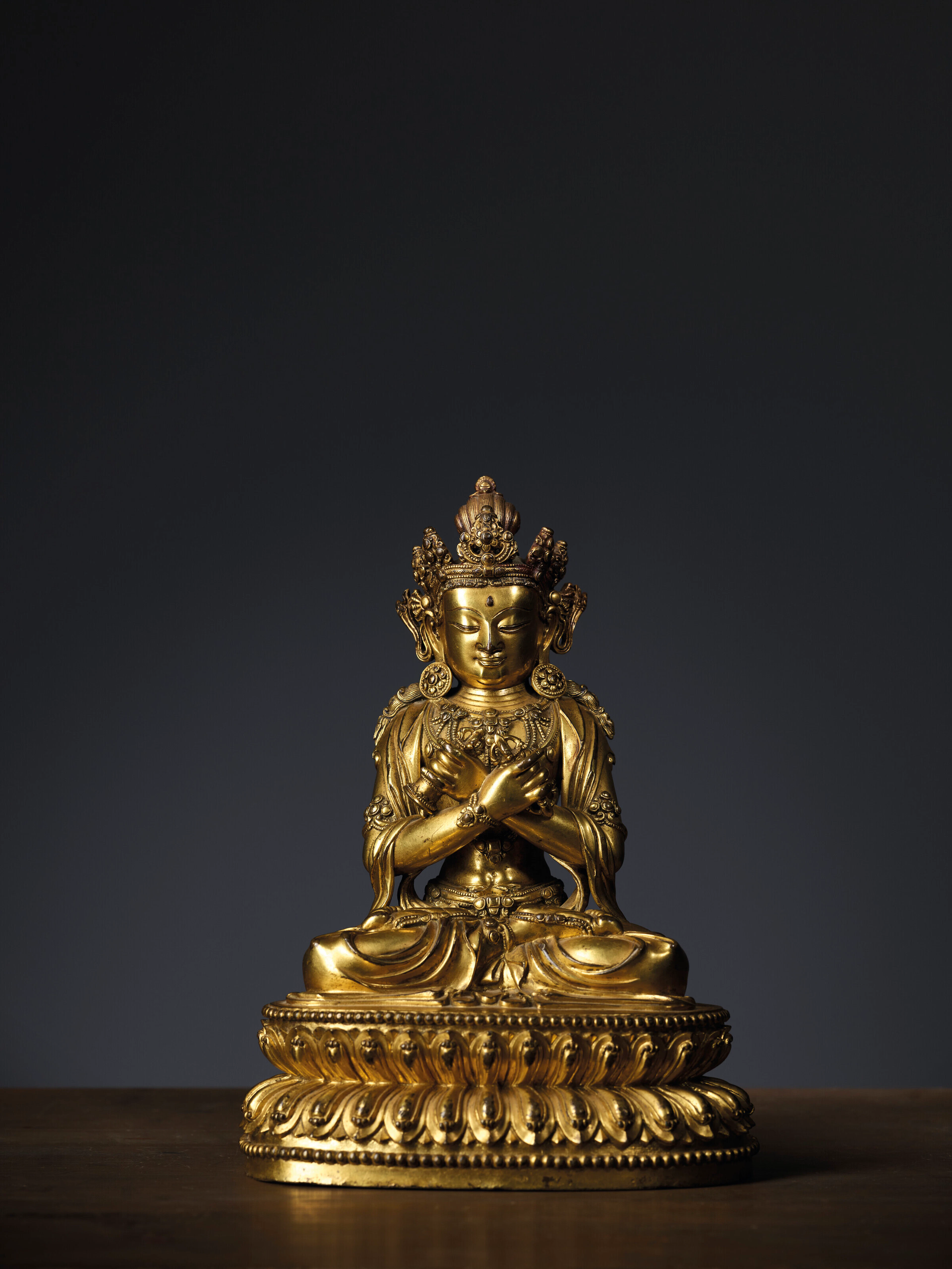 A RARE EARLY-MING GILT-BRONZE FIGURE OF VAJRADHARA