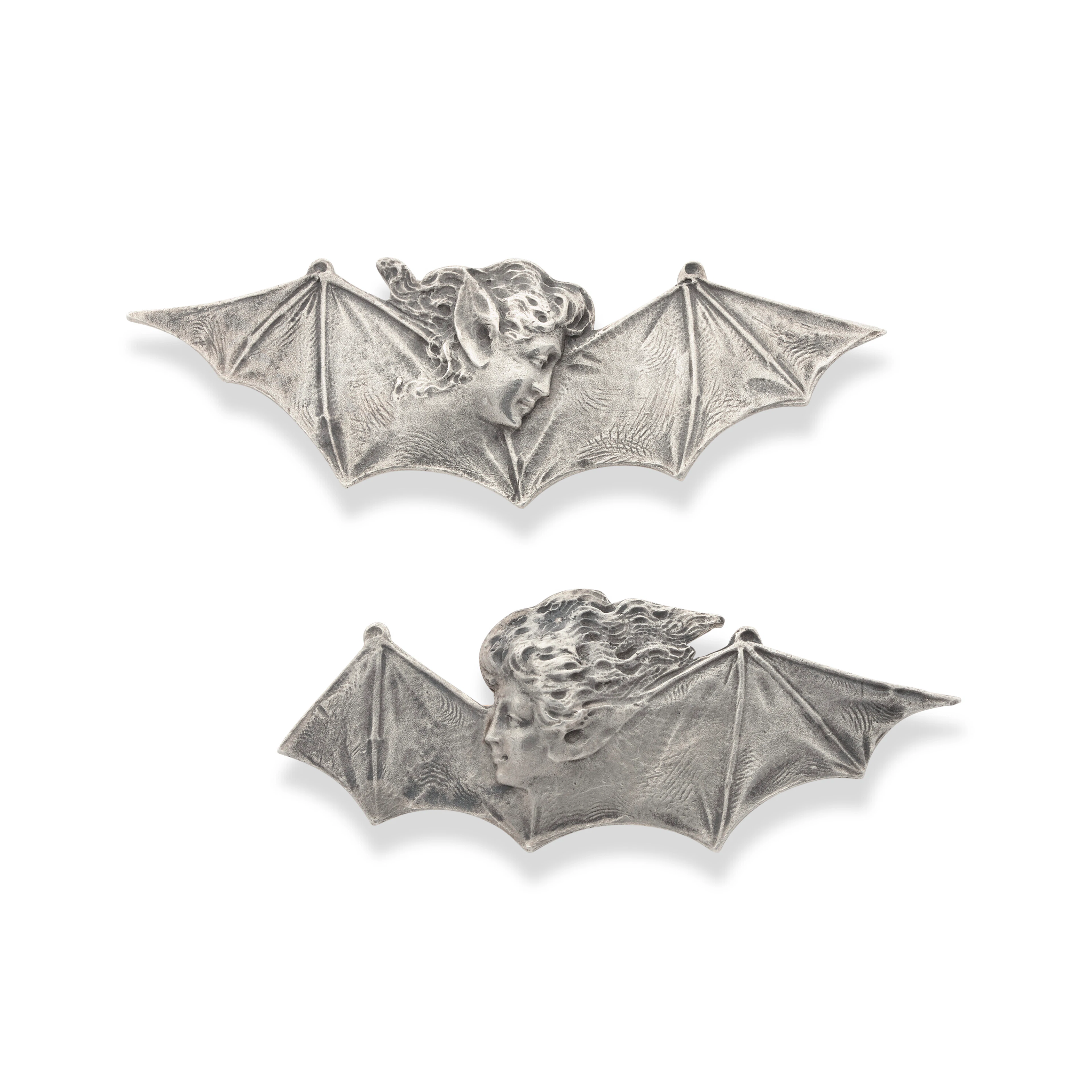 GEORGES FOUQUET ENSEMBLE DE DEUX BROCHES 'FEMMES AILÉES' ARGENT ET OR