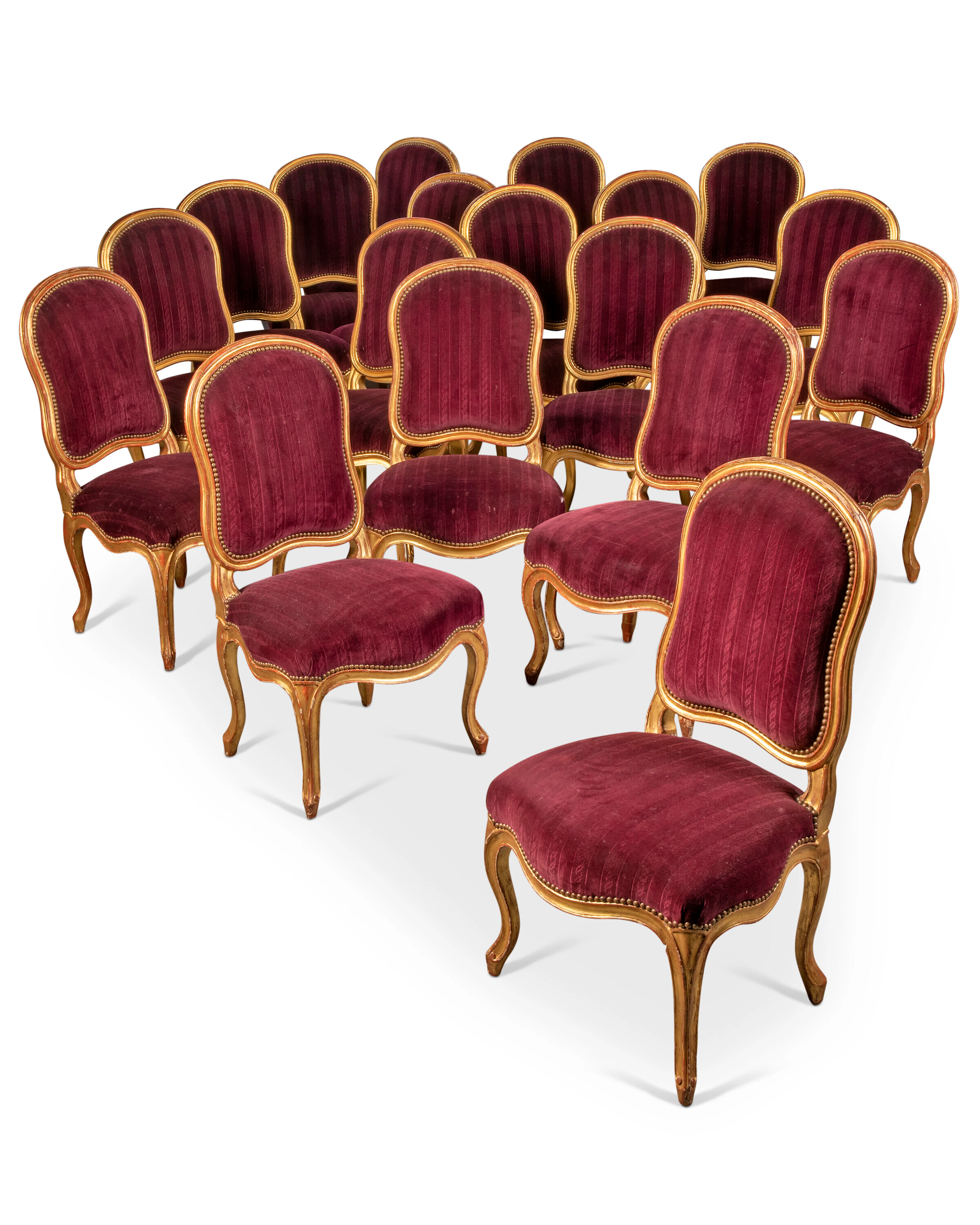 A SET OF EIGHTEEN LOUIS XV GILTWOOD CHAISES