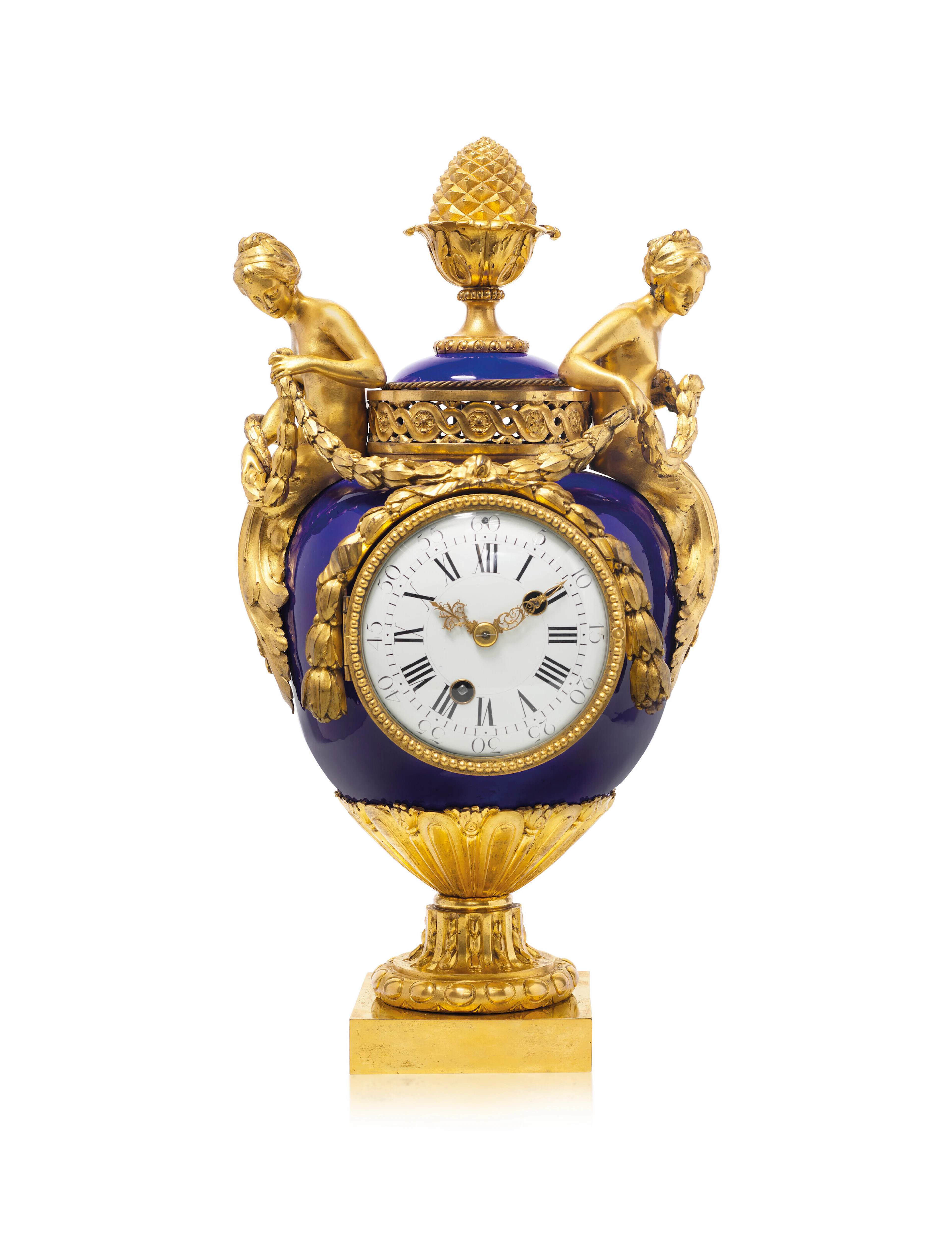 A LOUIS XVI ORMOLU-MOUNTED SEVRES BLEU DU ROI PORCELAIN CLOCK