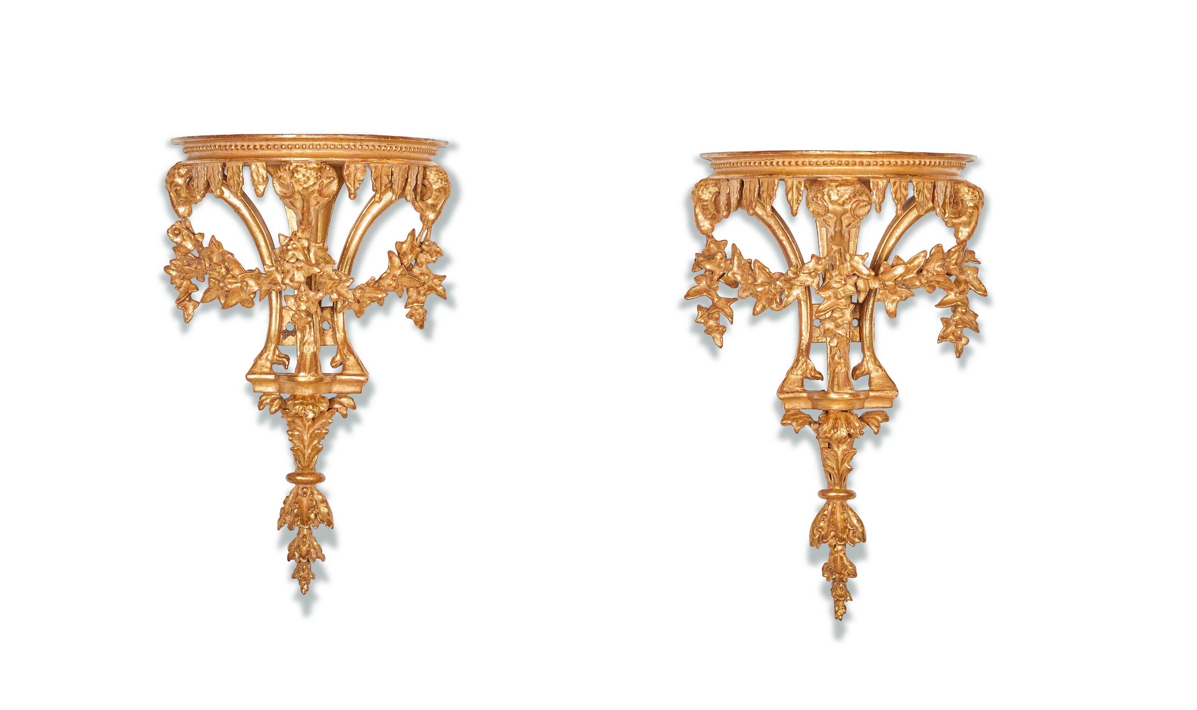 A PAIR OF GEORGE III GILTWOOD WALL BRACKETS