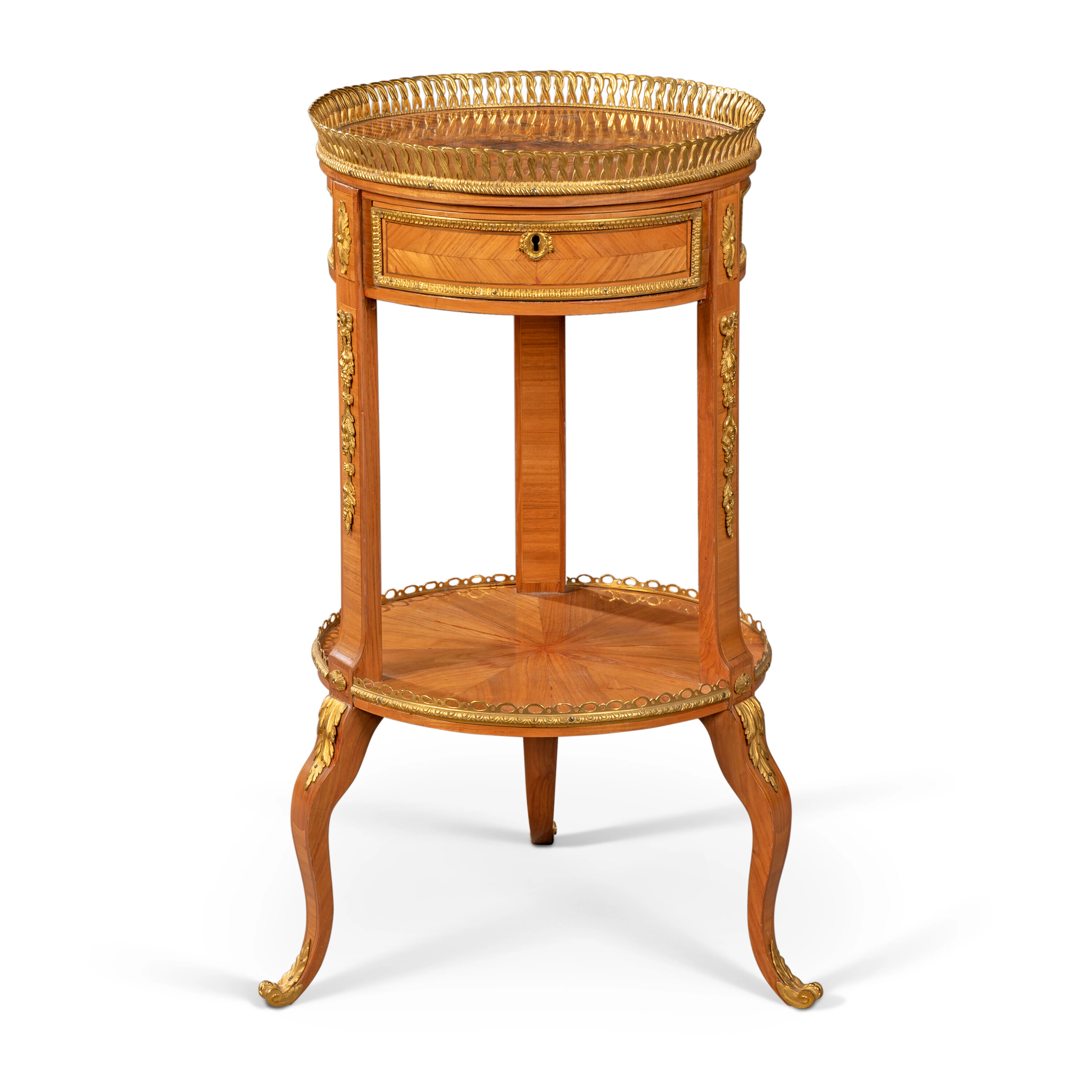 A FRENCH ORMOLU-MOUNTED TULIPWOOD AND KINGWOOD BOIS-DE-BOUT MARQUETRY GUERIDON