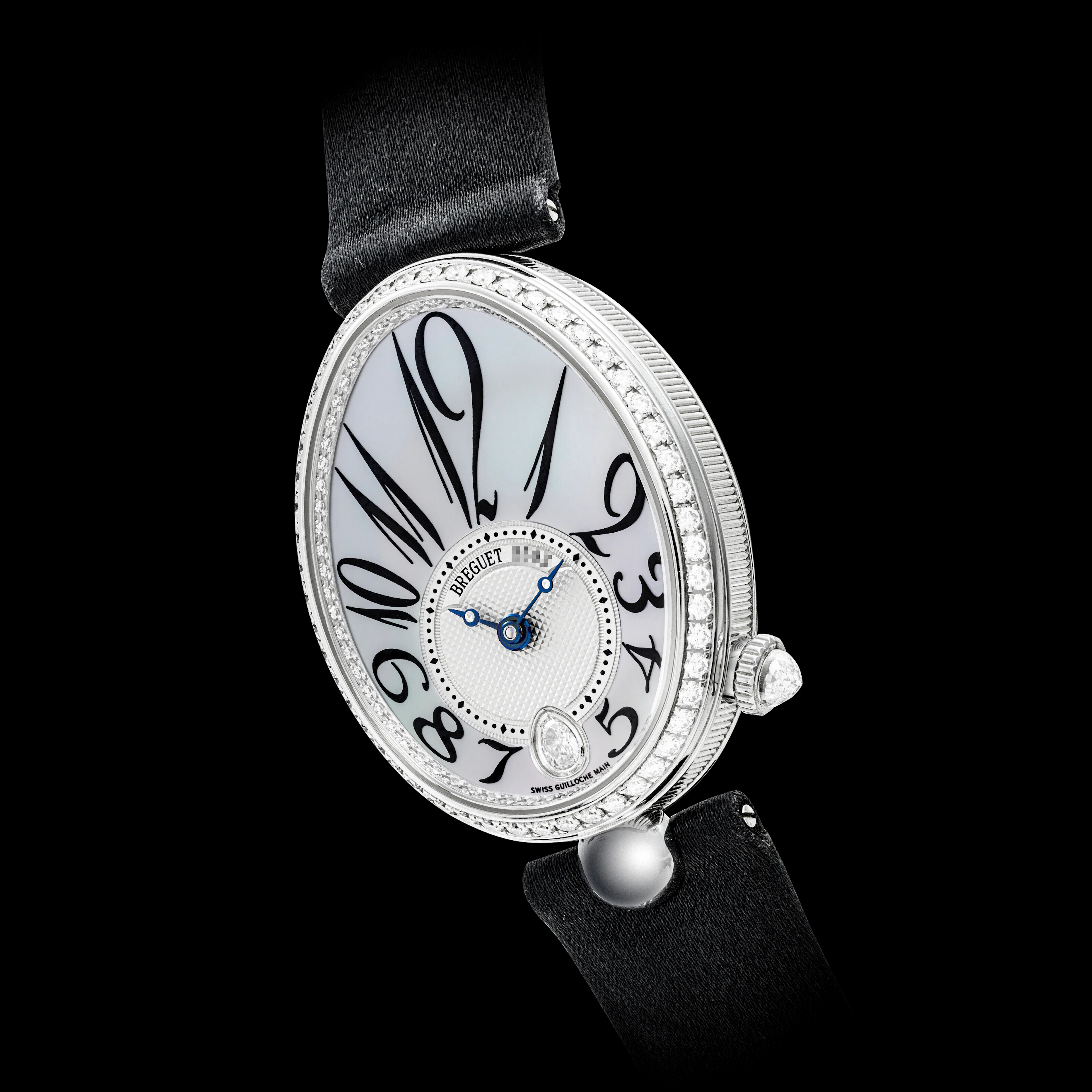 BREGUET. A LADY’S 18K WHITE GOLD AND DIAMOND-SET...