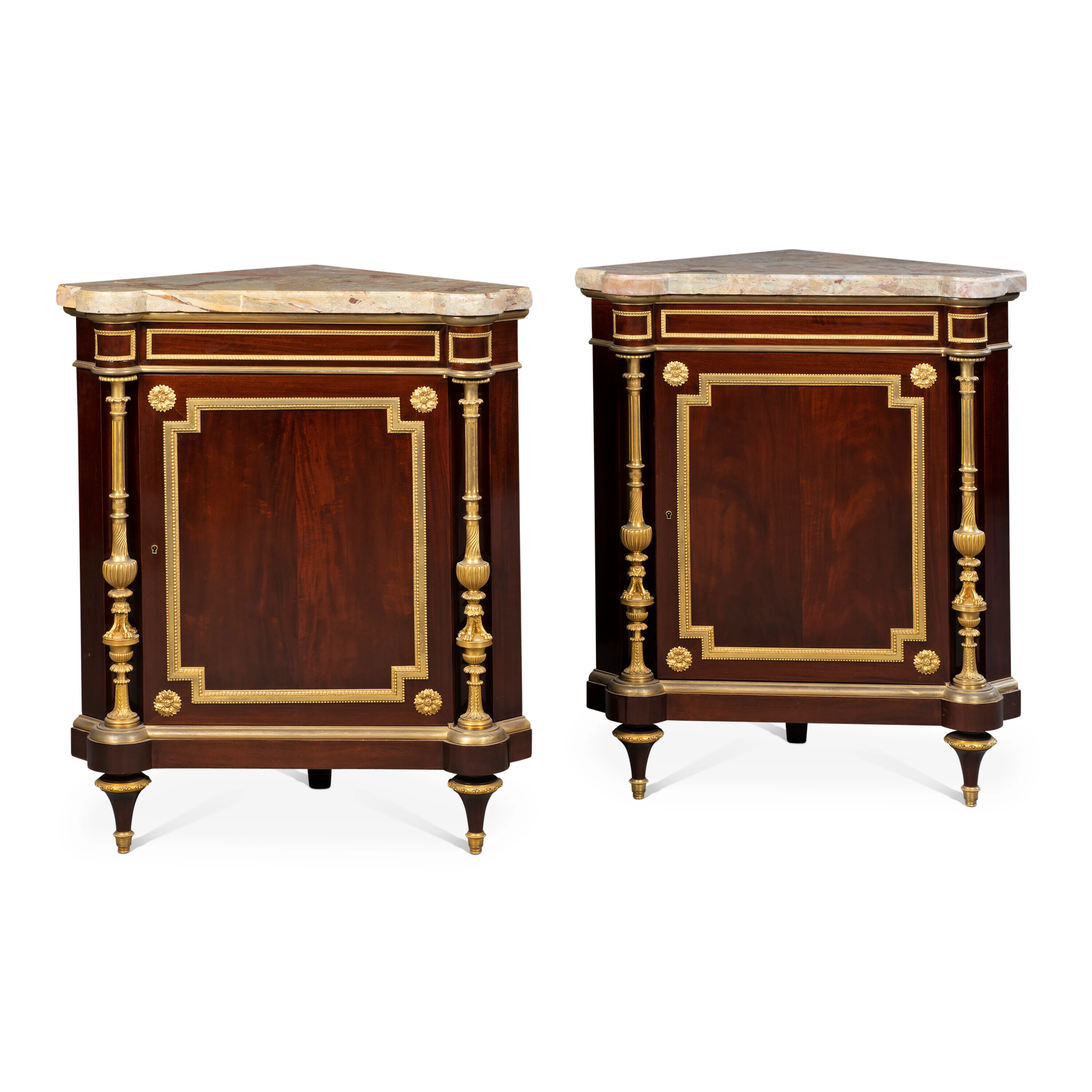 A PAIR OF FRENCH ORMOLU-MOUNTED MAHOGANY ENCOIGNURES