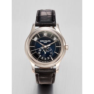 PATEK PHILIPPE. AN ATTRACTIVE 18K WHITE GOLD AUTOMATIC ANNUAL CALENDAR