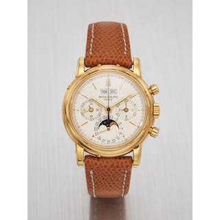 PATEK PHILIPPE. A VERY RARE AND ATTRACTIVE 18K GOLD PERPETUAL CALENDAR