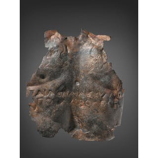 A FRAGMENTARY GREEK BRONZE INSCRIBED BACK-PLATE FROM AN ANATOMICAL CUIRASS