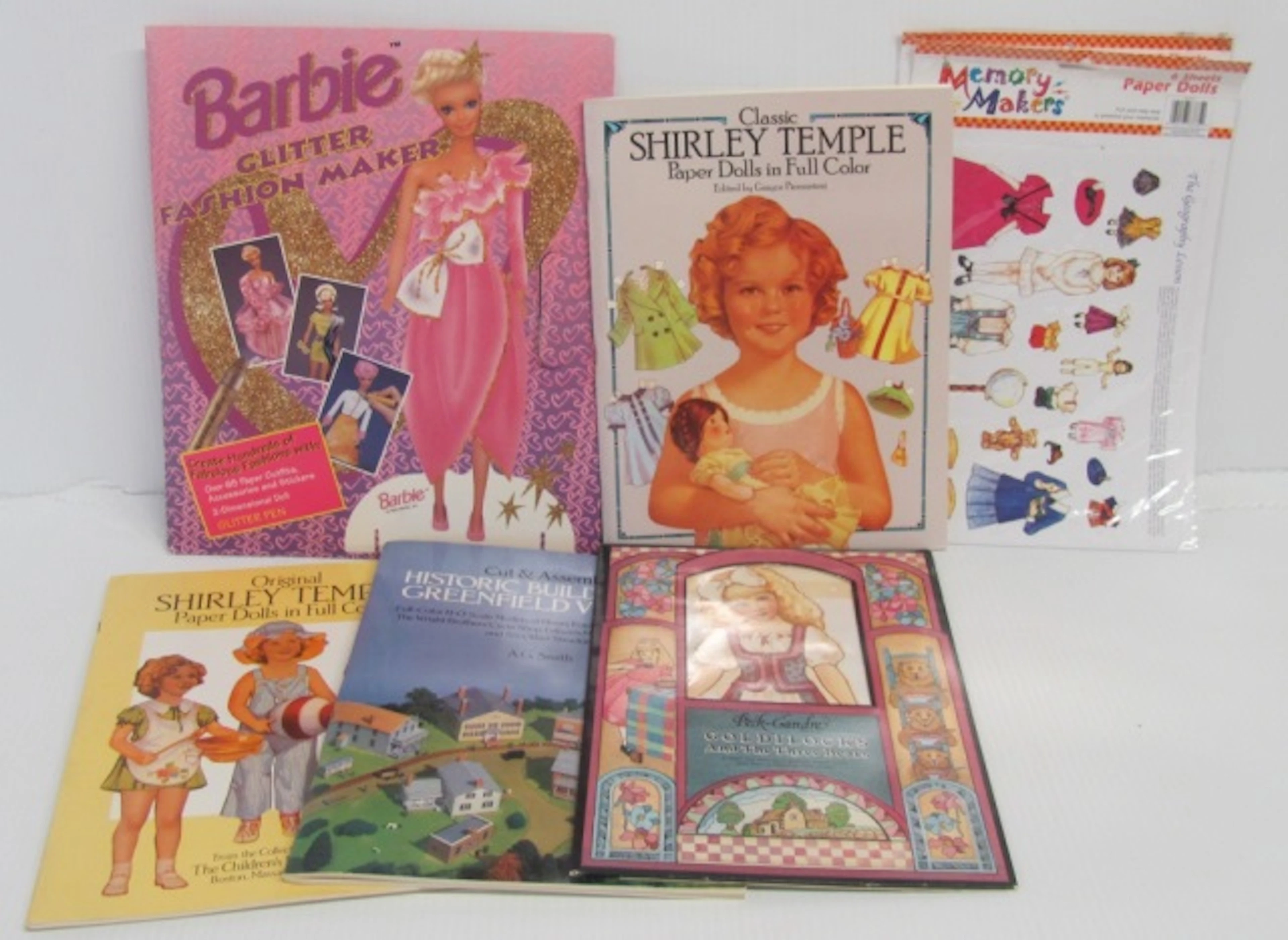 Large group (35+) uncut paper doll books