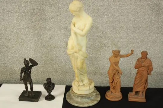 Five reproduction ancient Greek or Roman statues. The largest of the ...