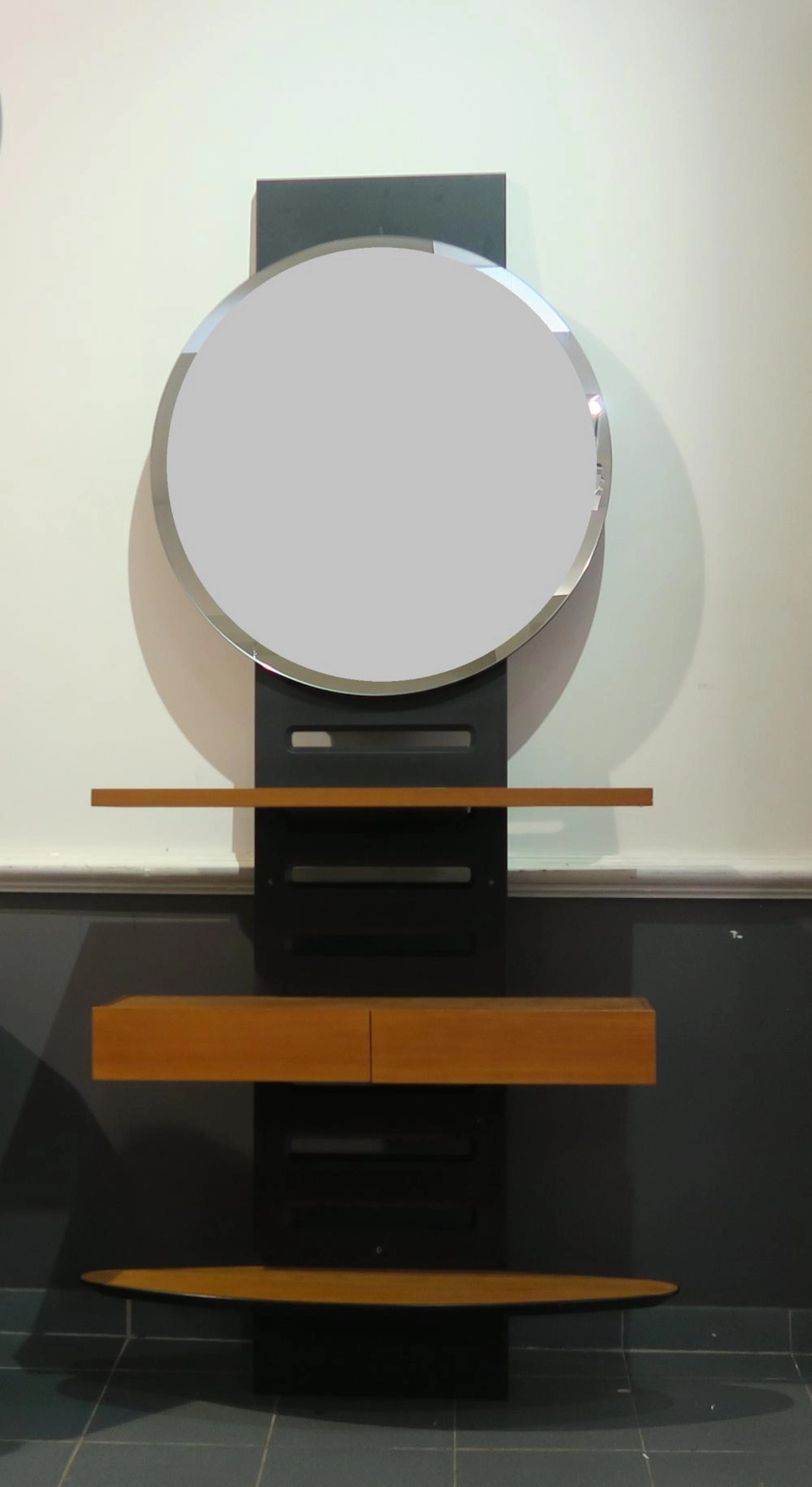 Etagère contemporaine avec miroir ovale.