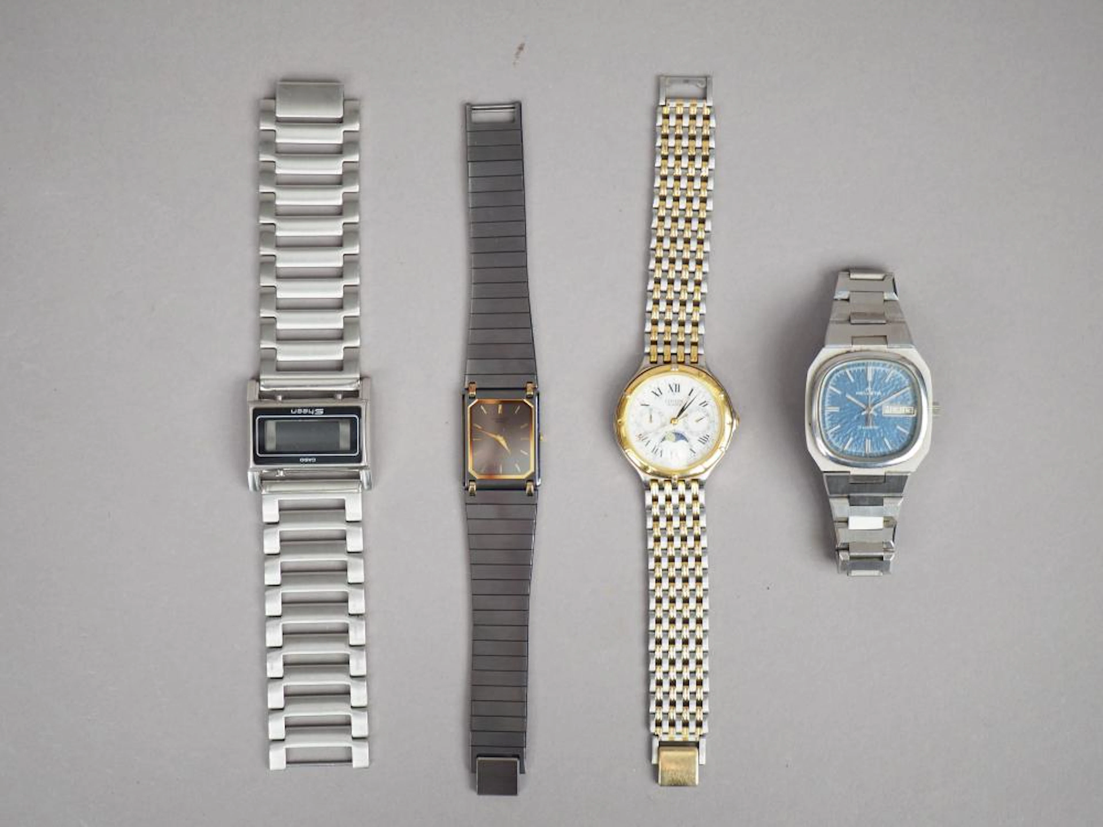 Ensemble de quatre montres, comprenant :
