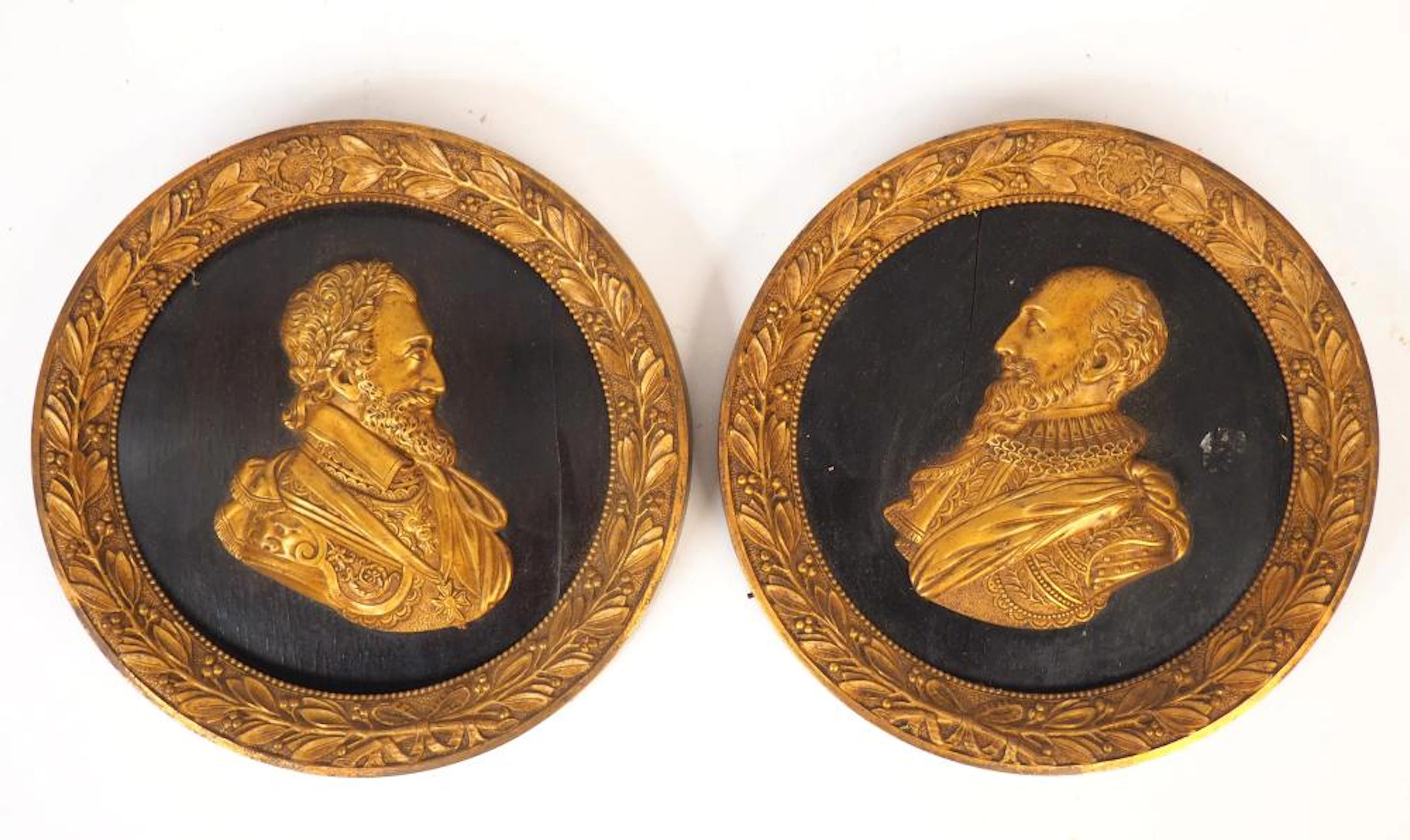 Paire de tondos XIXème en bronze « Henri IV et Sully », sur fond plaqué d?ébène.