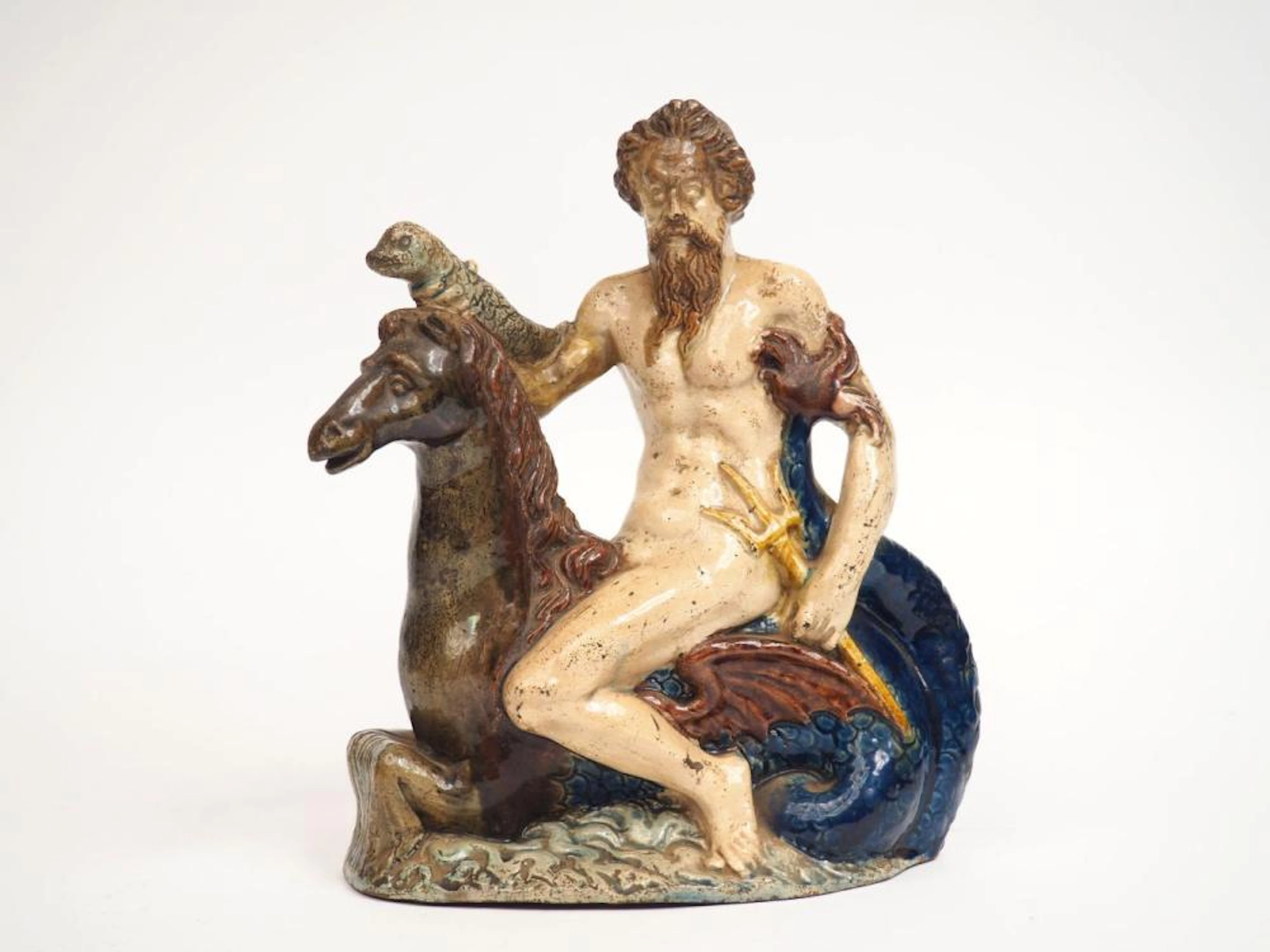 eptune en terre cuite émaillée polychrome.