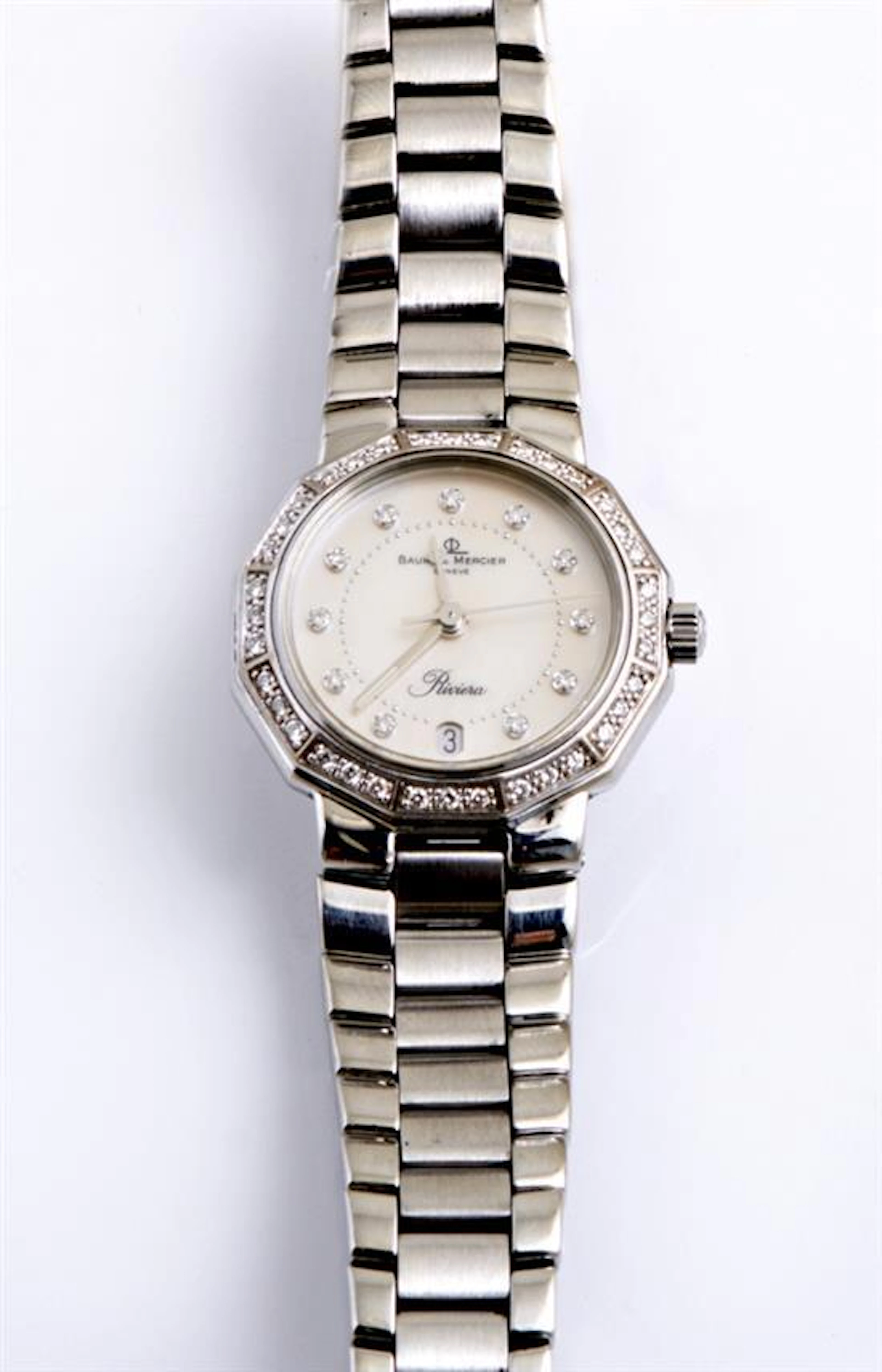 Lady's Stainless Steel Baume Mercier Wristwatch Ser # 4271232, the octagonal mother-of-pearl face with diamond chapter marks and a d..