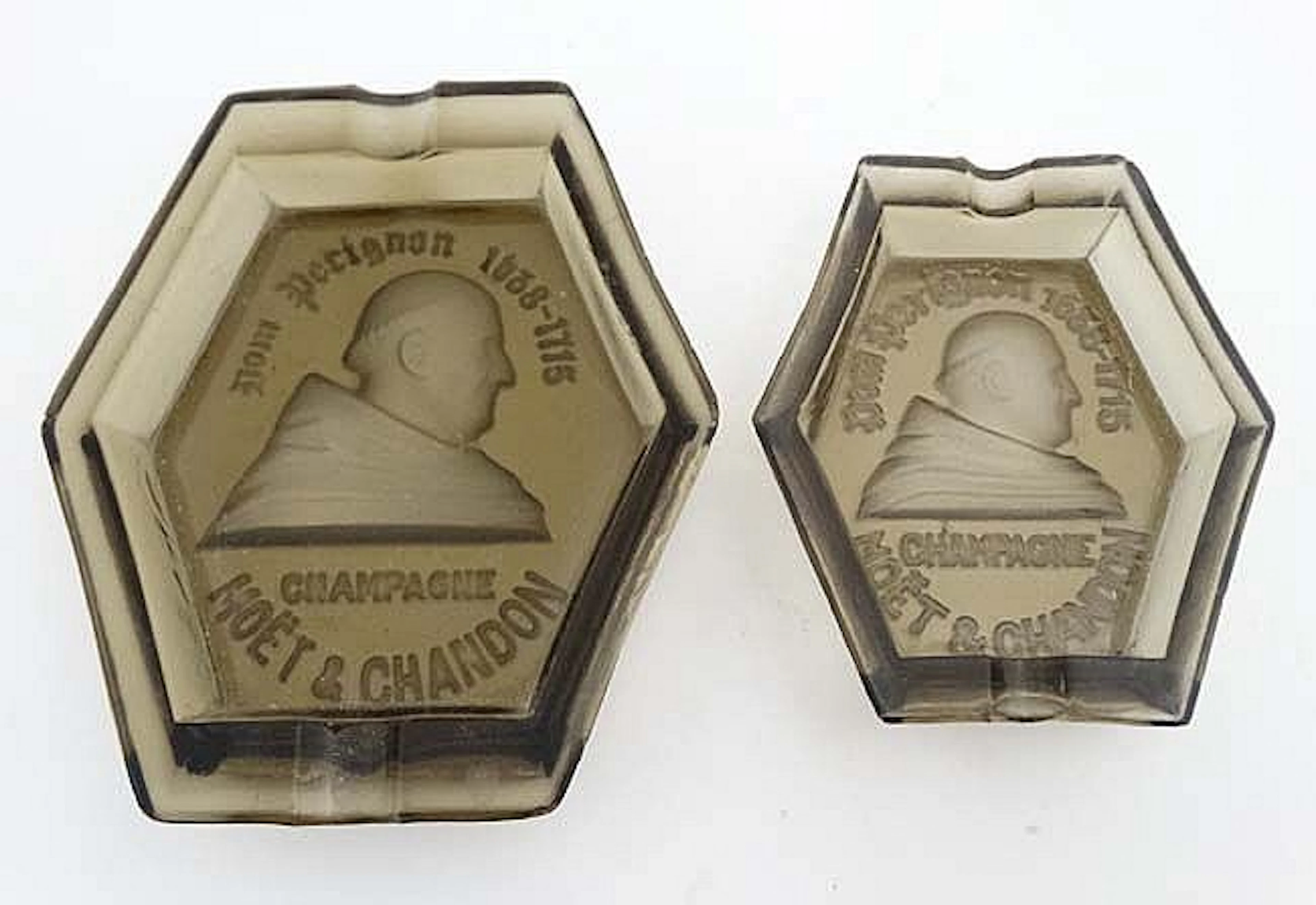 Advertising : 2 smoke glass ashtrays with intaglio