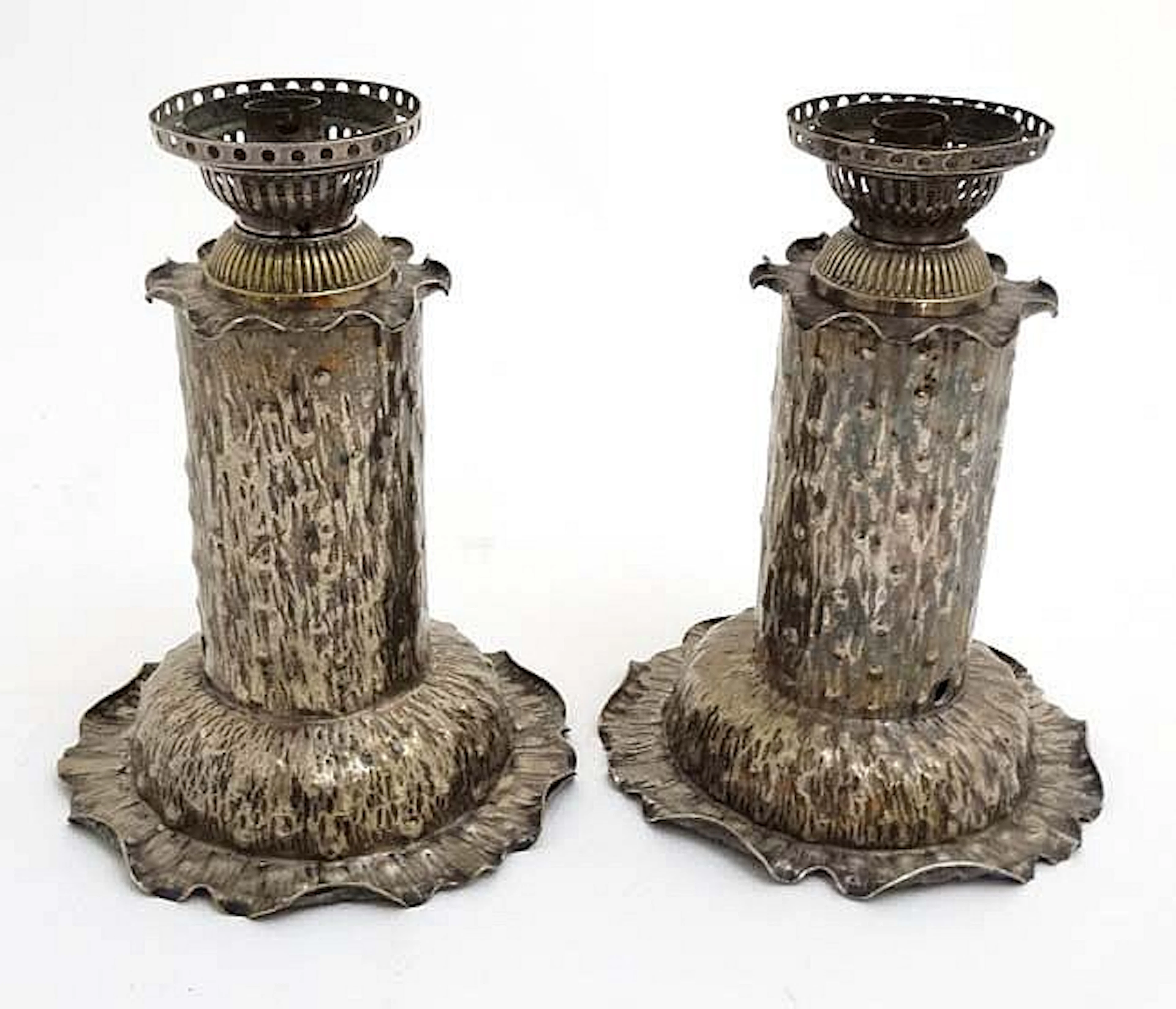 Dr Christopher Dresser (1834-1904): An Aesthetic Movement pair of silver pl