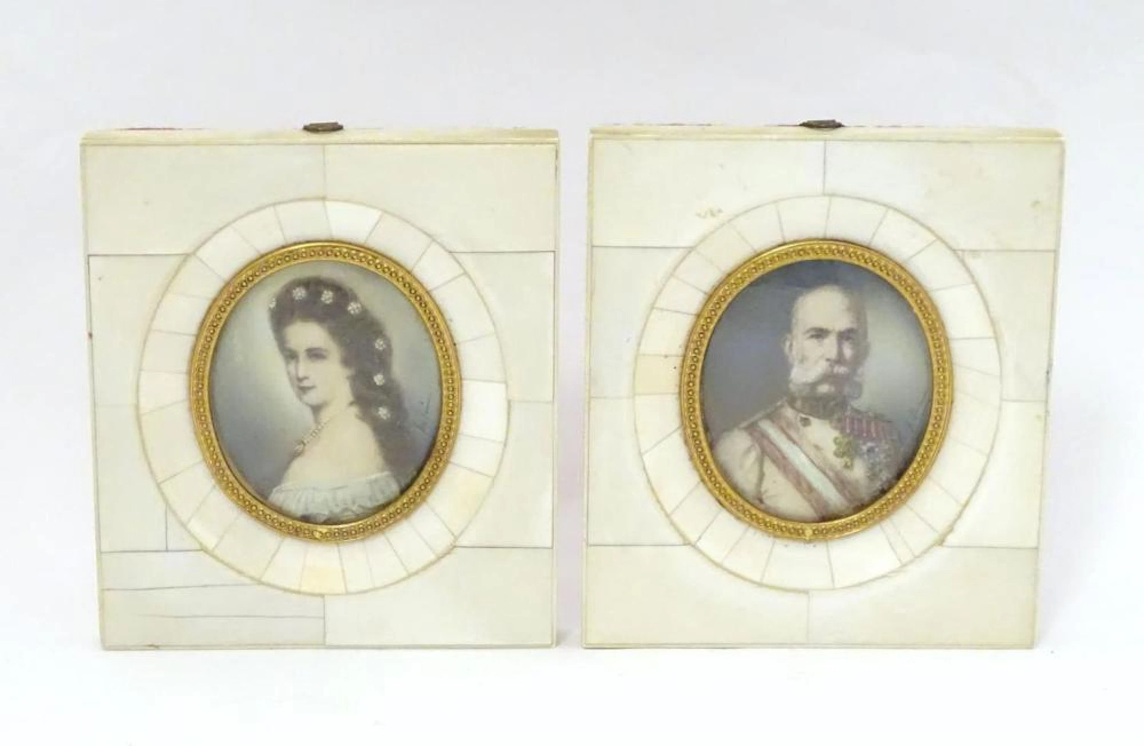 A pair of 19thC oval watercolour portrait miniatures depicting Franz Joseph I and Empress Elisabeth