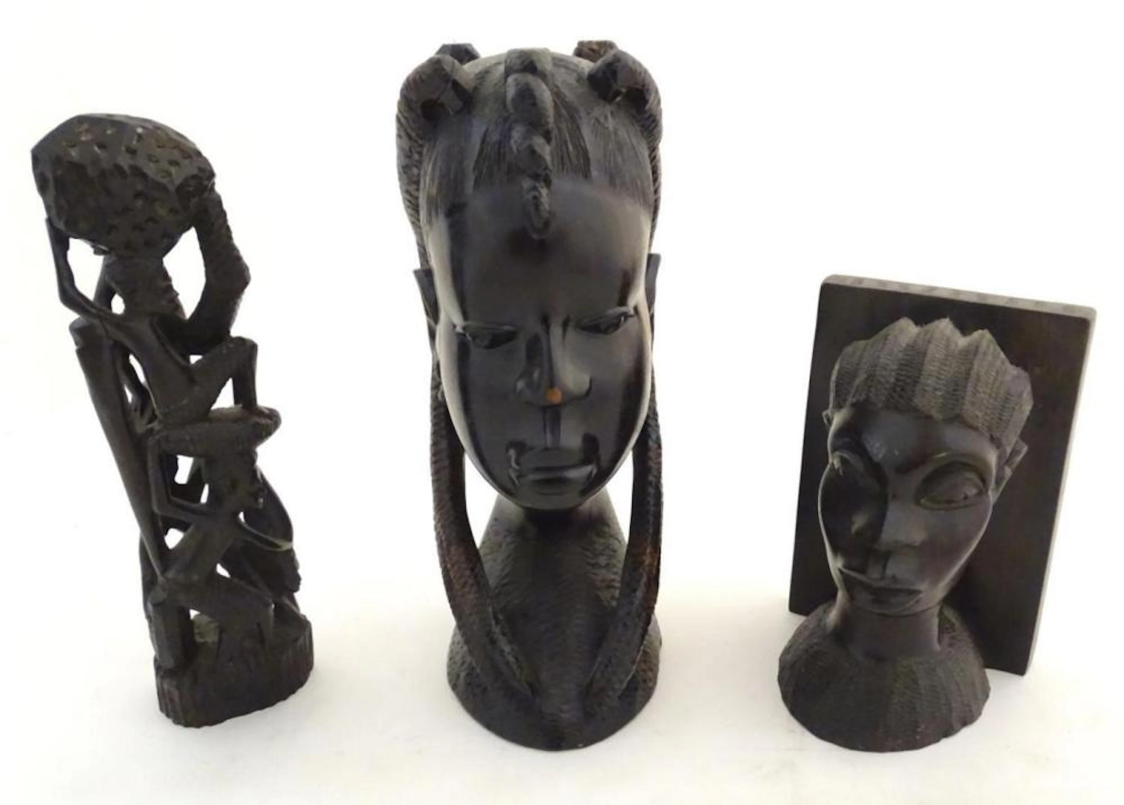 Ethnographic / Native / Tribal: Three African hardwood carvings, to include a bust of a woman, a car