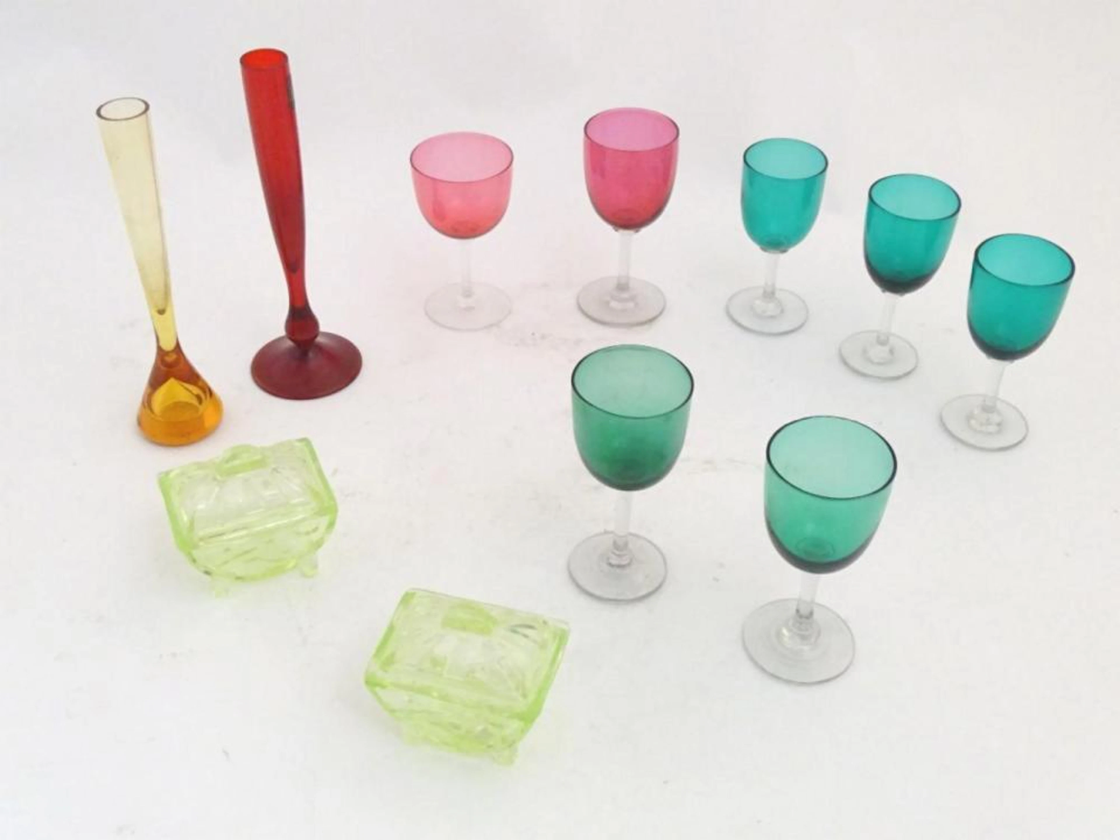 Assorted glass items to include cranberry and green glass drinking glasses, Art Deco lime green glas